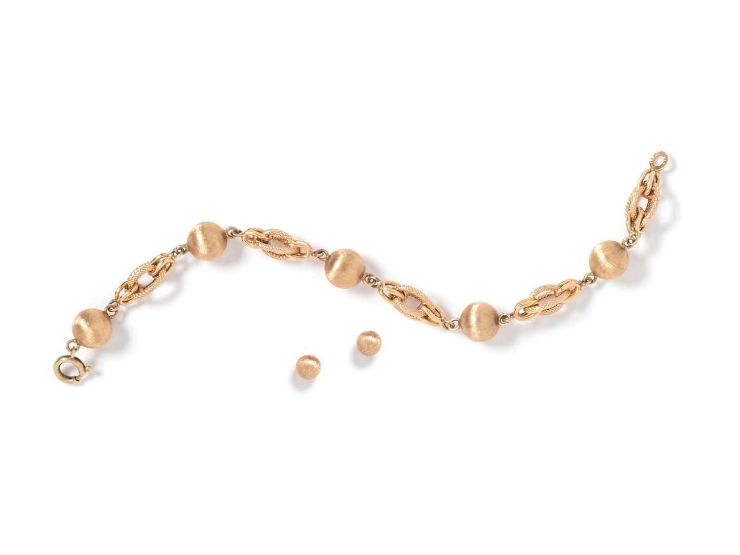 A 14 Karat Yellow Gold Demi-Parure,