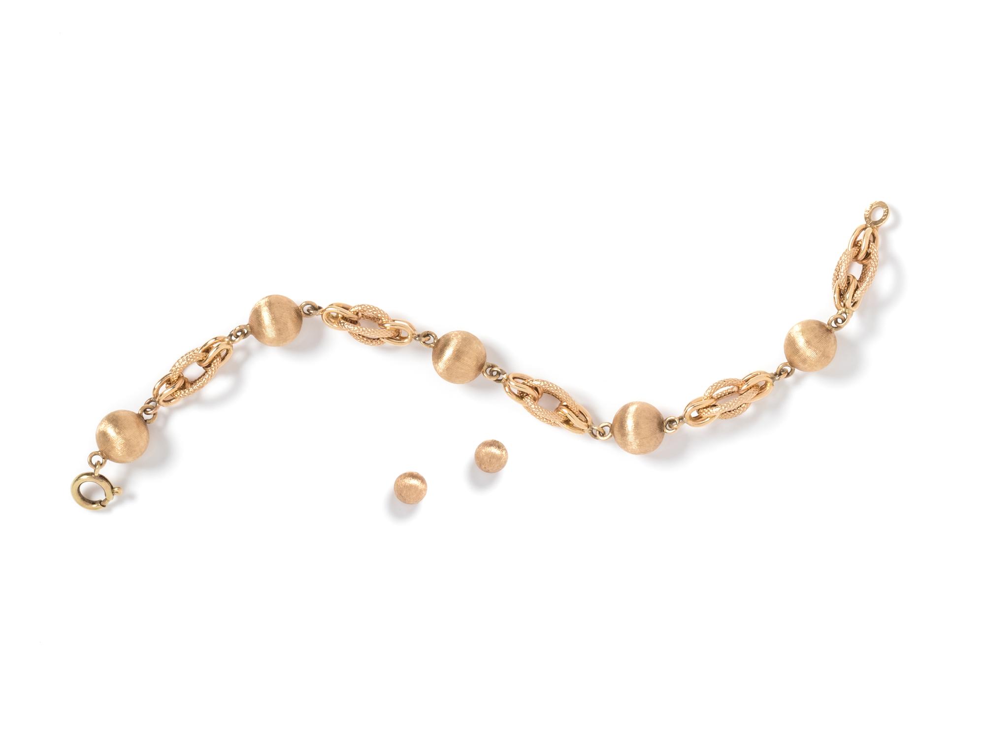A 14 Karat Yellow Gold Demi-Parure,