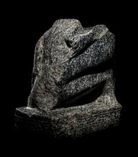 An Egyptian Gneiss Fragment of a Kneeling Figure