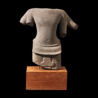 A Khmer Carved Grey Sandstone Torso of Lokesvara, 10th-First Half 12th Century 十世紀上半葉至十二世紀 高棉石造像