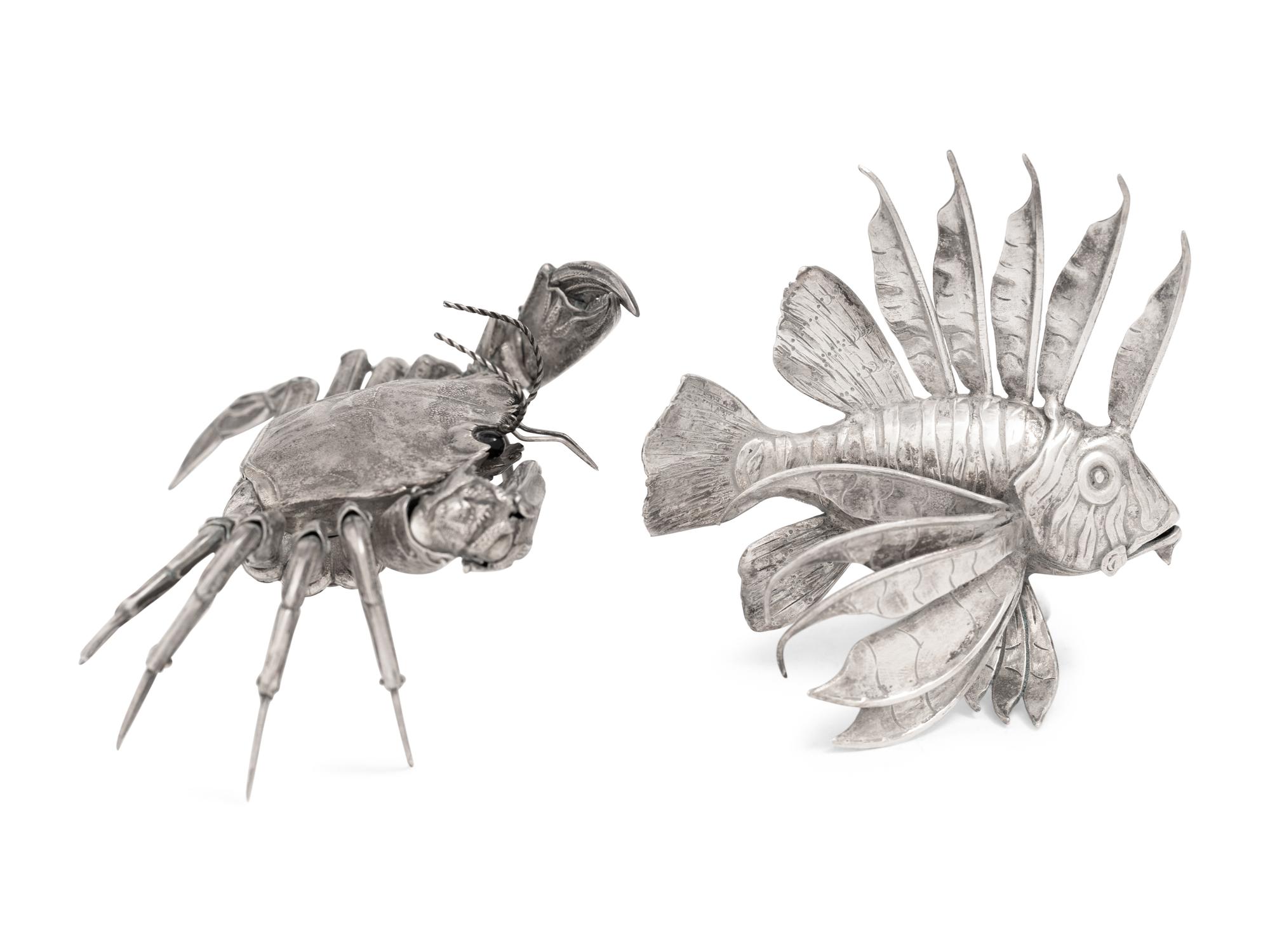 A Silver Model of a Crab and Lionfish