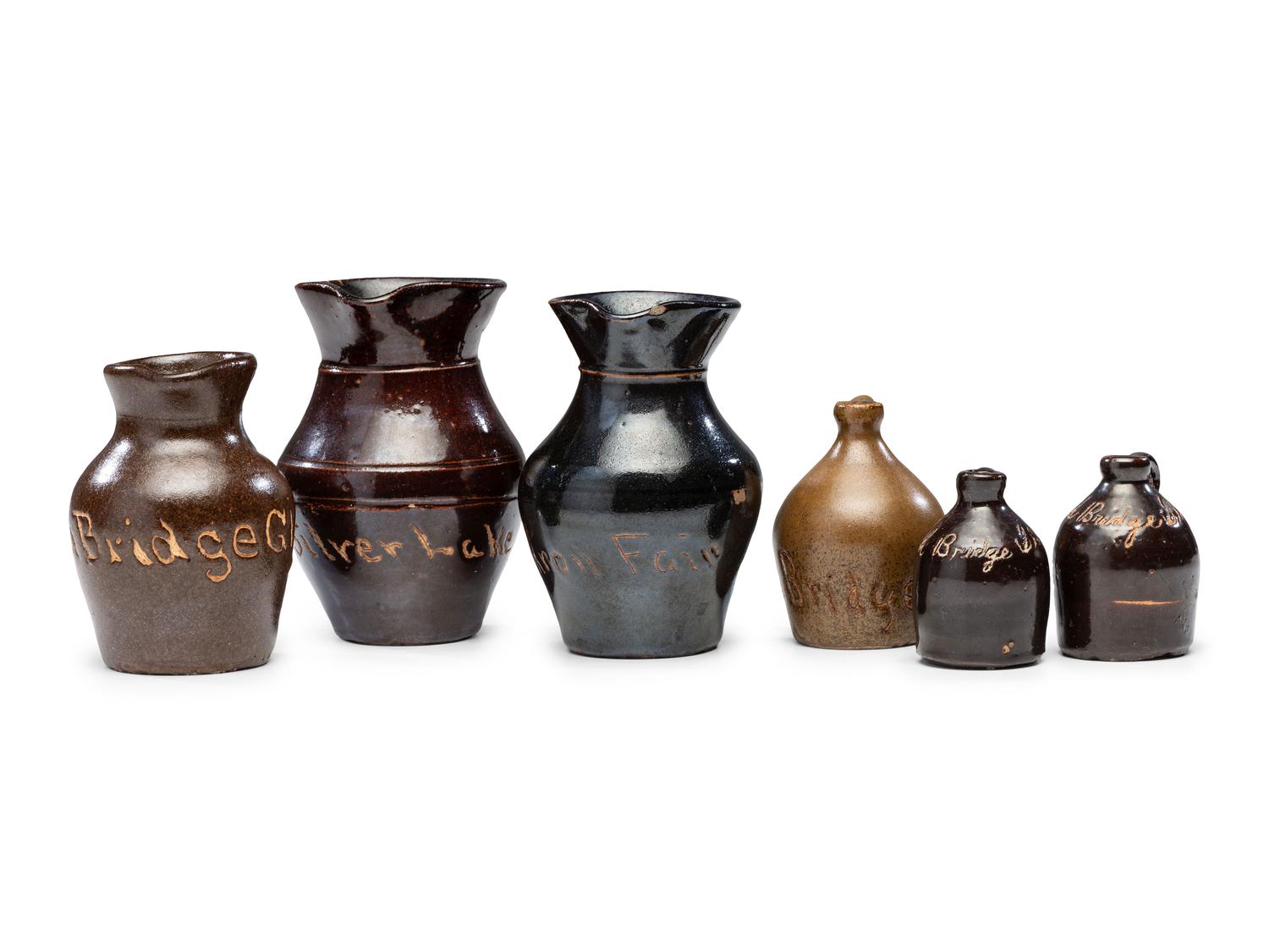 Six Fair and Amusement Park Souvenir Slip-Glazed Miniature Stoneware Vessels