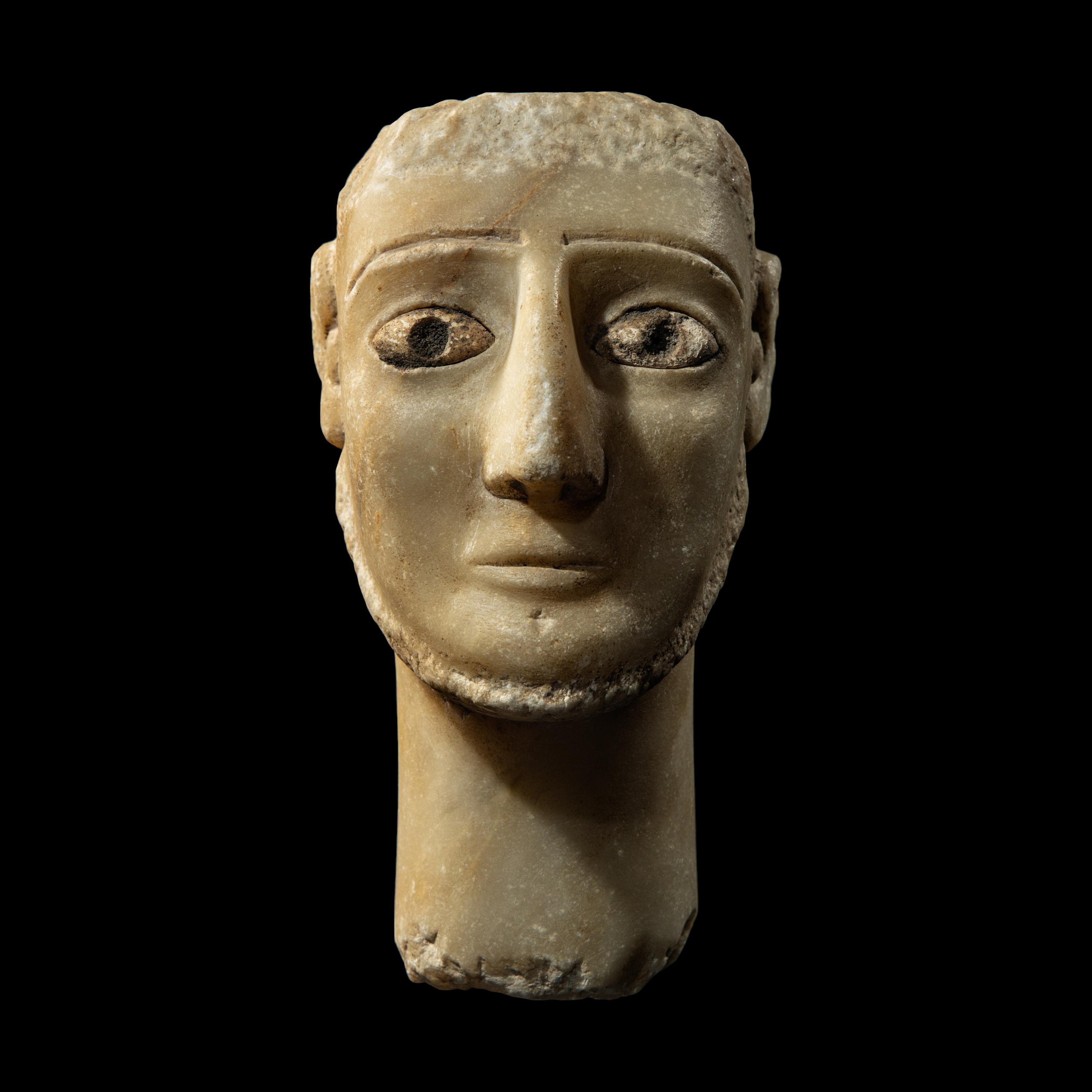 A South Arabian Alabaster Head of a Bearded Man