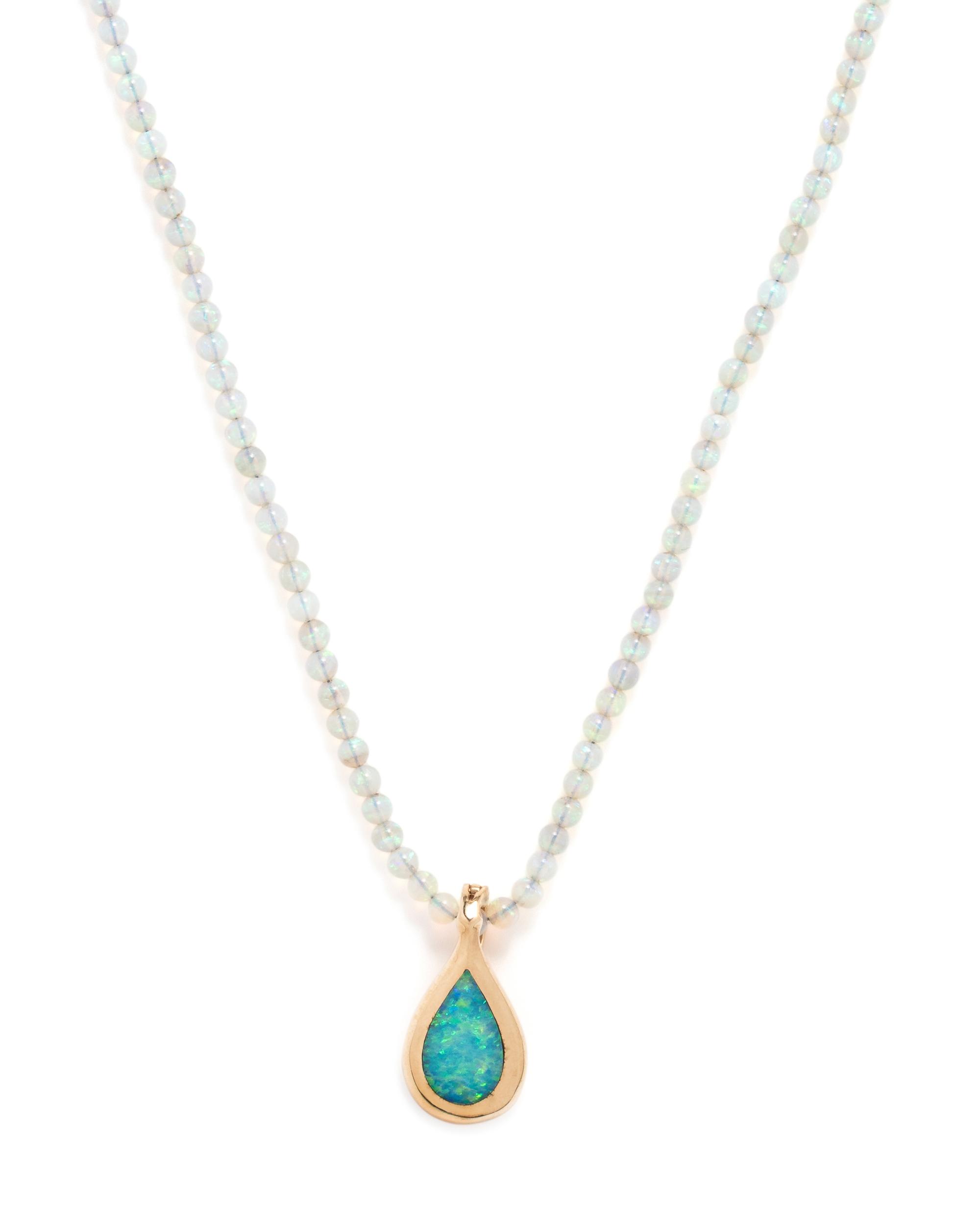 COLLECTION OF YELLOW GOLD AND OPAL JEWELRY