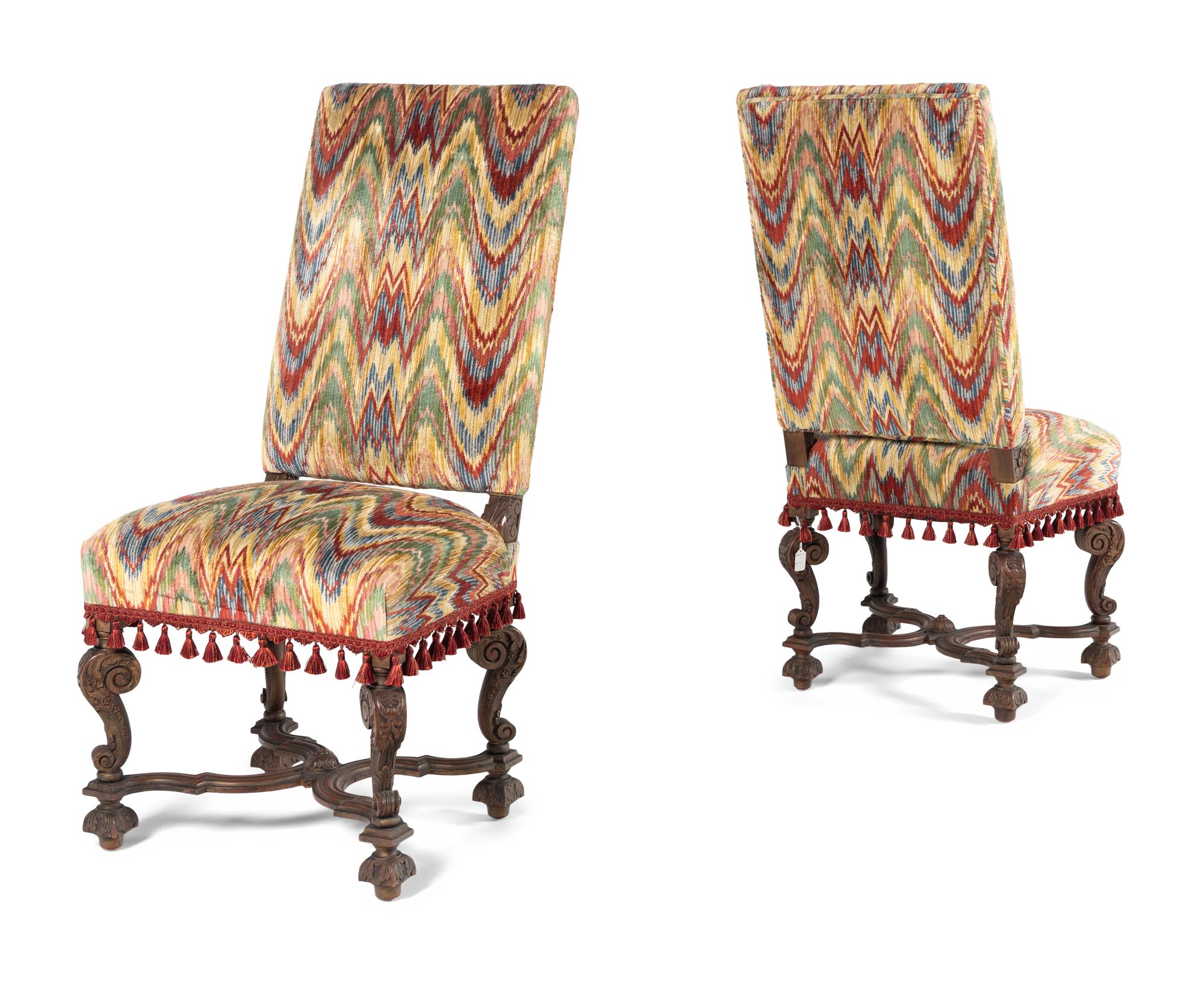 A Pair of William and Mary Style Carved Walnut Side Chairs