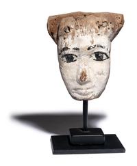 An Egyptian Painted Wood Mummy Mask