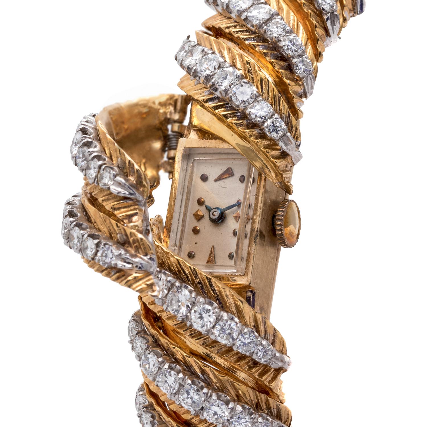 YELLOW GOLD AND DIAMOND SURPRISE WRISTWATCH