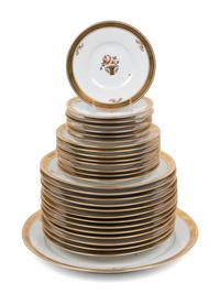 A Royal Copenhagen Gold Rose Porcelain Dinner Service