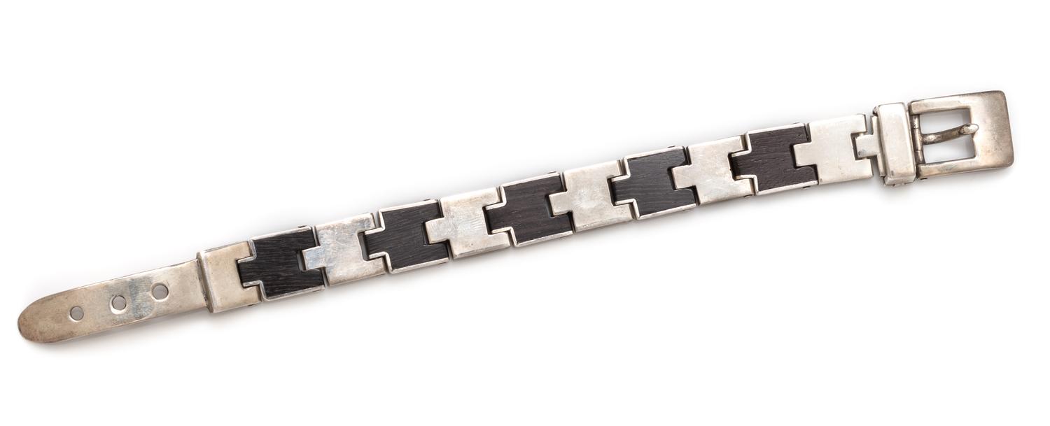 A Sterling Silver and Ebony Wood Buckle Bracelet, William Spratling, 45.10 dwts.