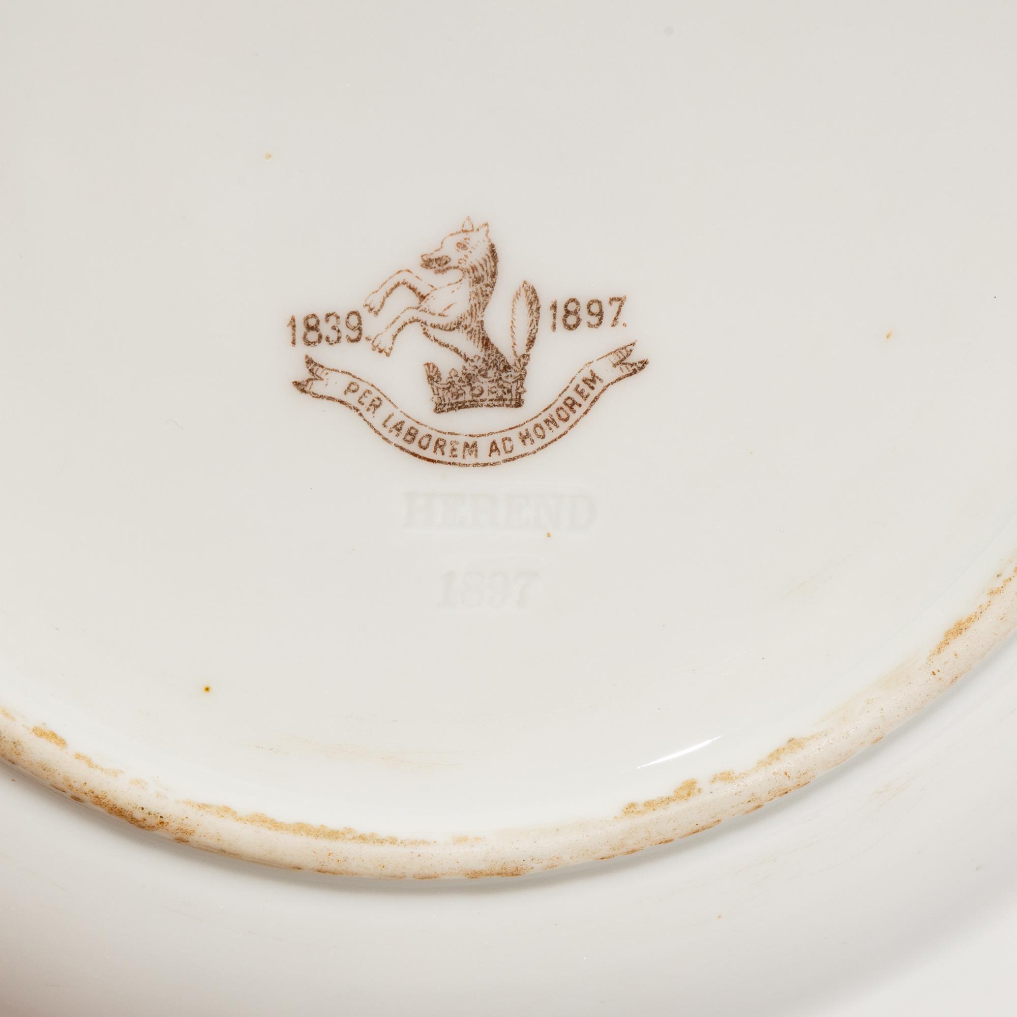 A Set of Five Herend Porcelain Fleur des Indies Dessert Plates