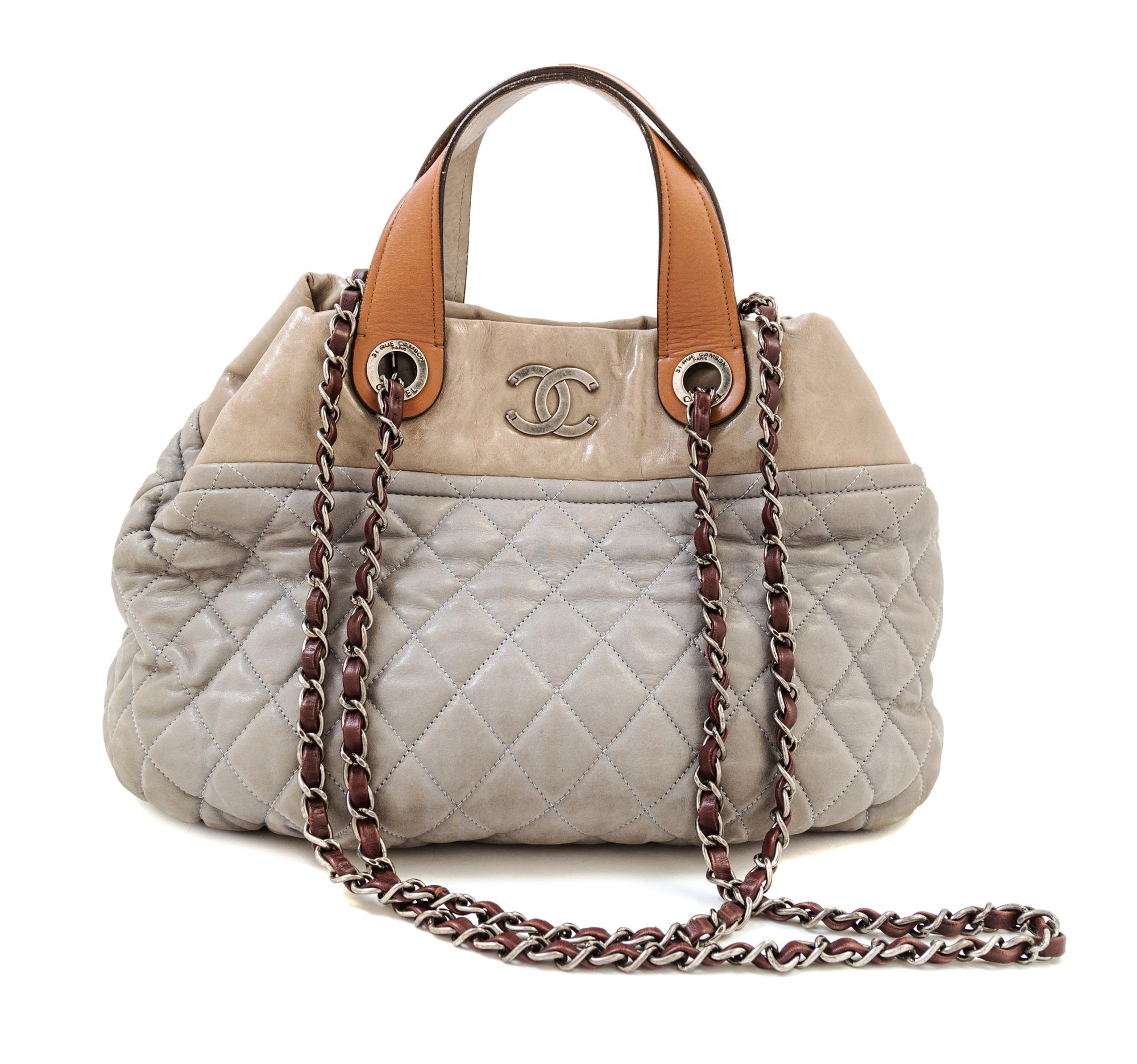 A Chanel Grey Leather Quilted Handbag, 15" x 10" x 5.5"; Handle drop: 4".