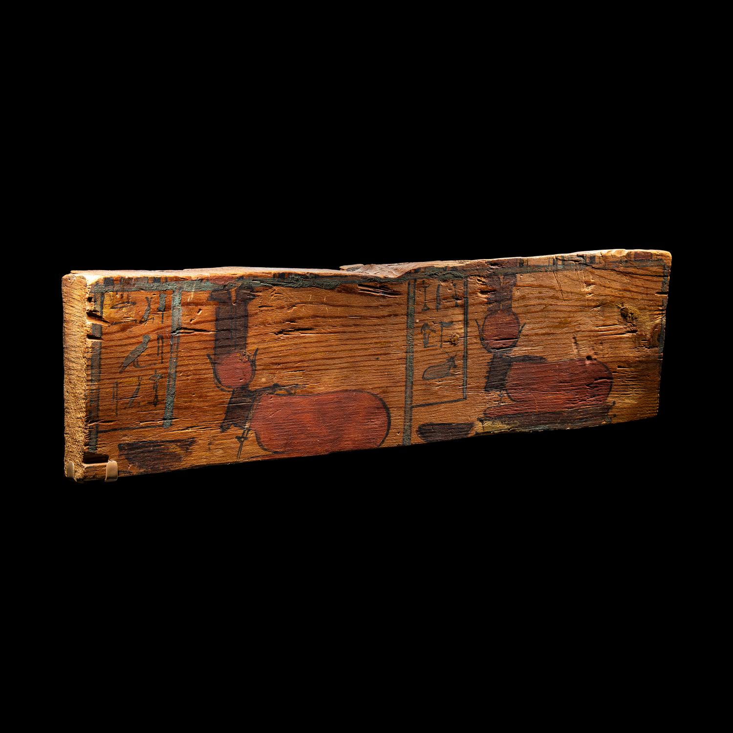 An Egyptian Wood Sarcophagus Fragment