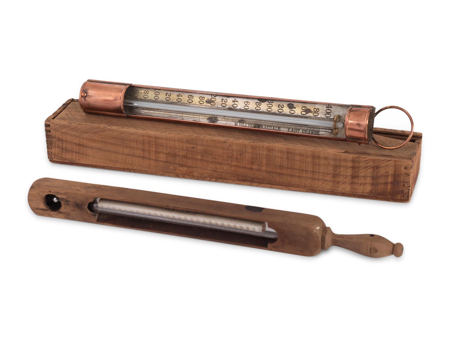 A Copper Tycos Candy Thermometer and a Wood Encased Floating Bath or Dairy Thermometer
