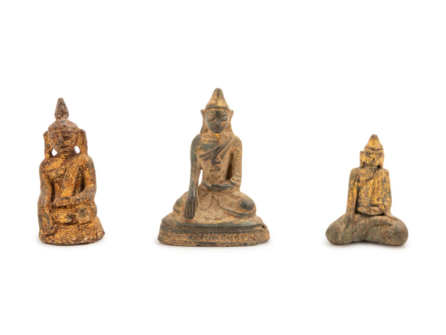 Three Thai Parcel-Gilt Bronze Figures of Buddha