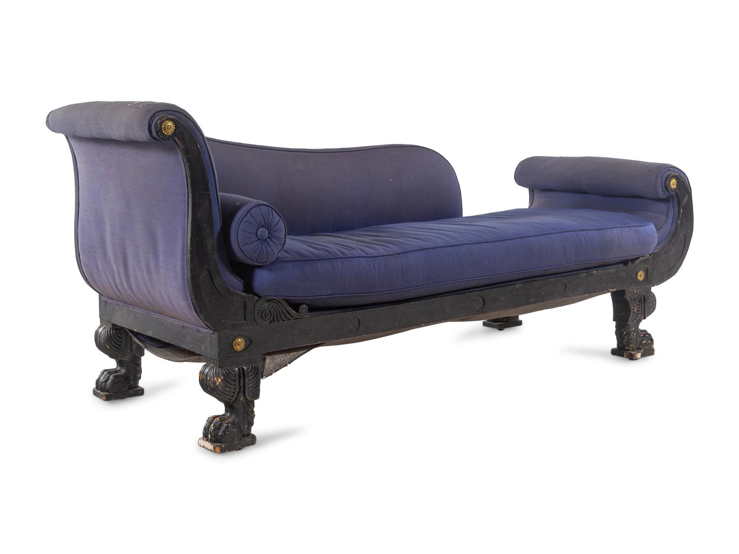 An Empire Style Gilt Metal Mounted Ebonized Chaise Longue