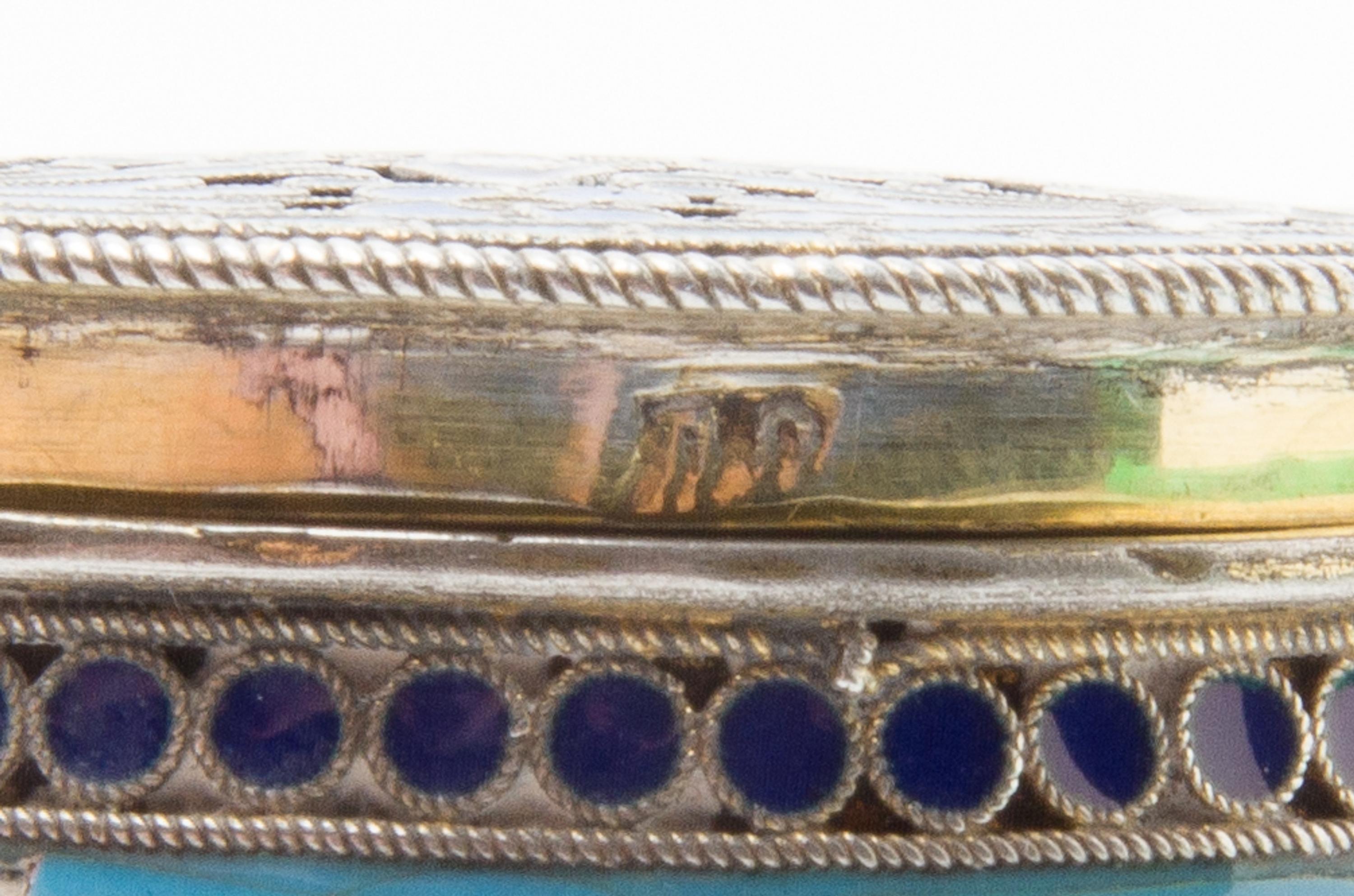 A Russian Silver and Enamel Snuff Box, Maker's mark obscured, Moscow, late 19th/early 20th century, of circular form, the case decorate
