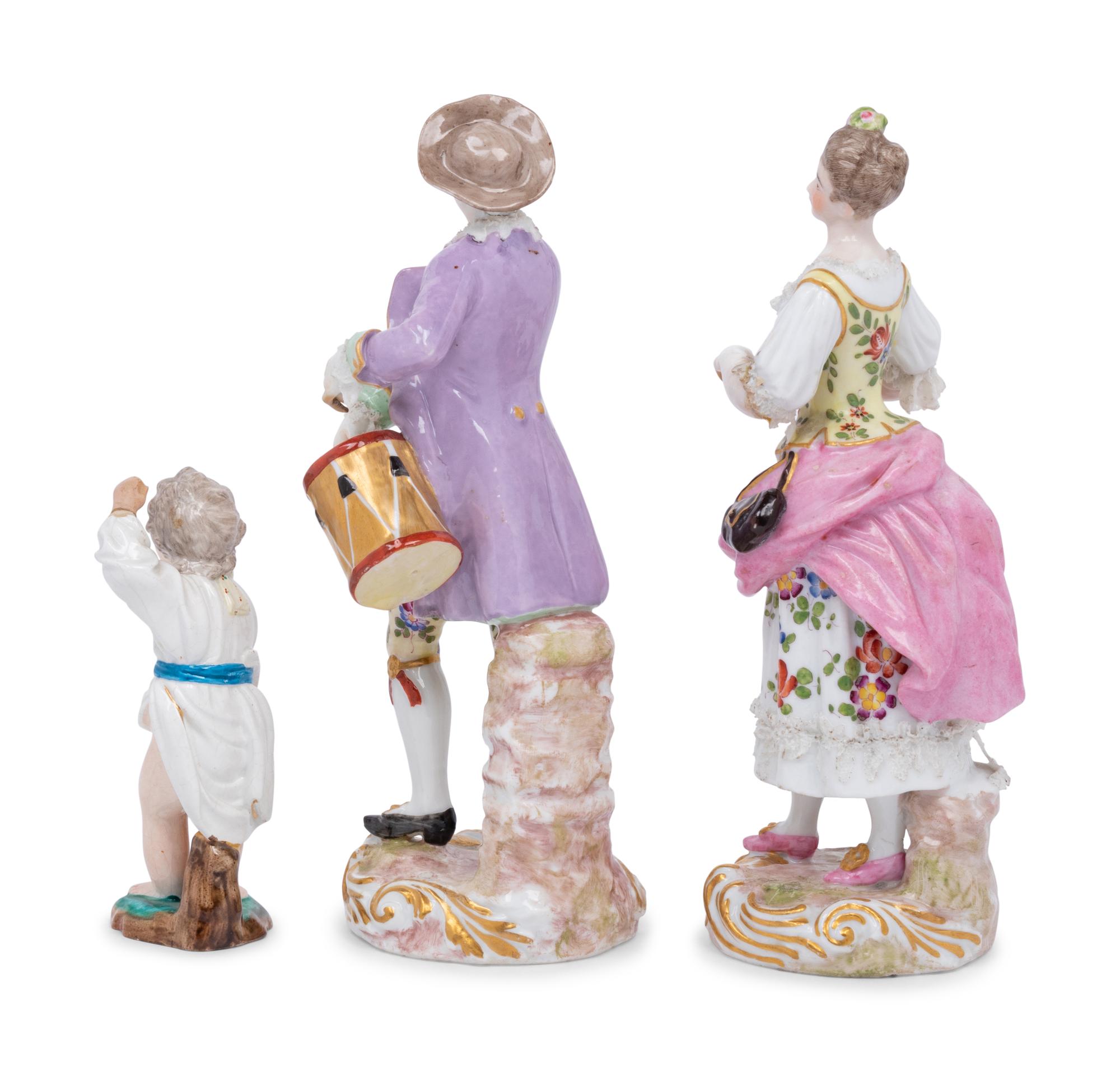 A Pair of Meissen Porcelain Figures and a German Porcelain Figure