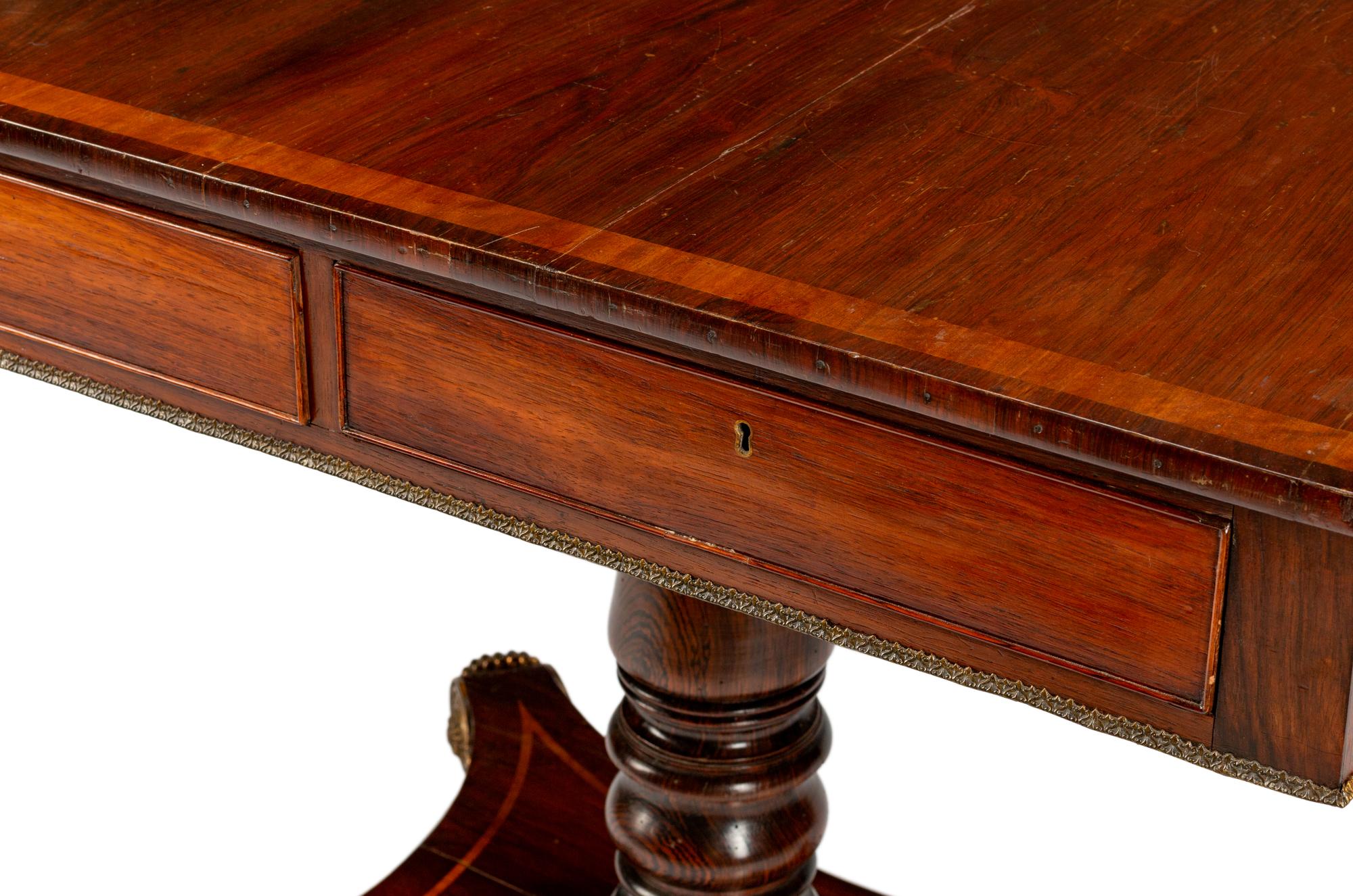 A Regency Gilt-Bronze-Mounted Rosewood Sofa Table — 19TH CENTURY