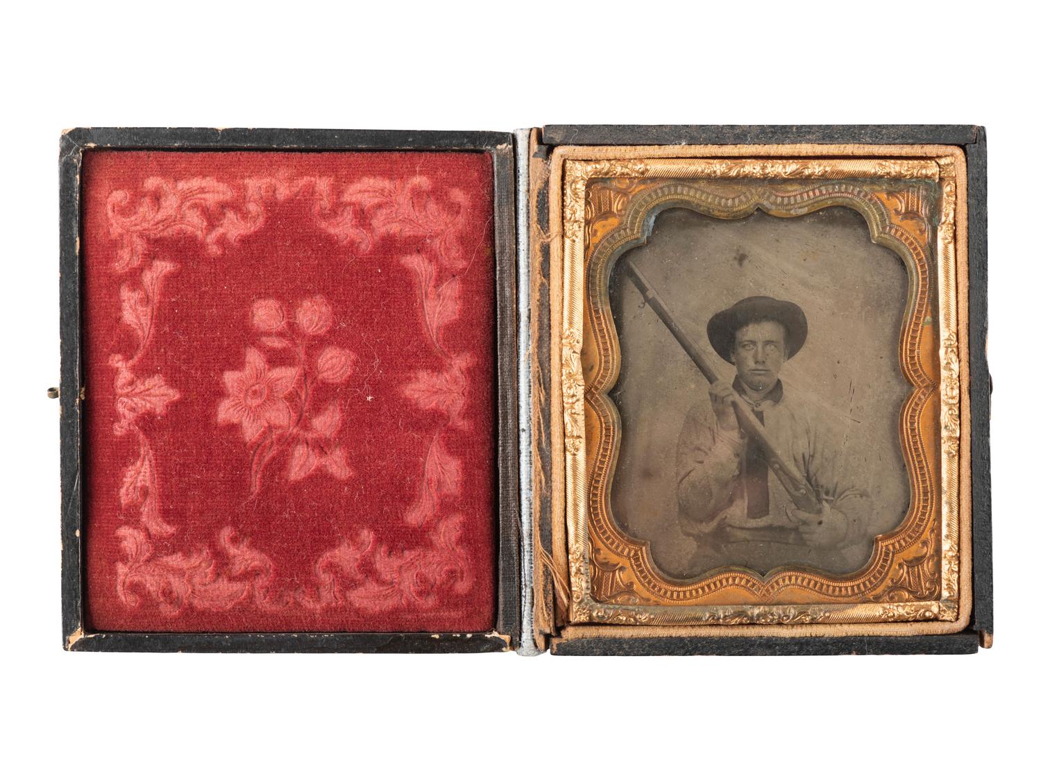 [CIVIL WAR - PHOTOGRAPHY]. Sixth plate ambrotype of an armed Confederate private. N.p.: N.p., [ca 1861-1865].