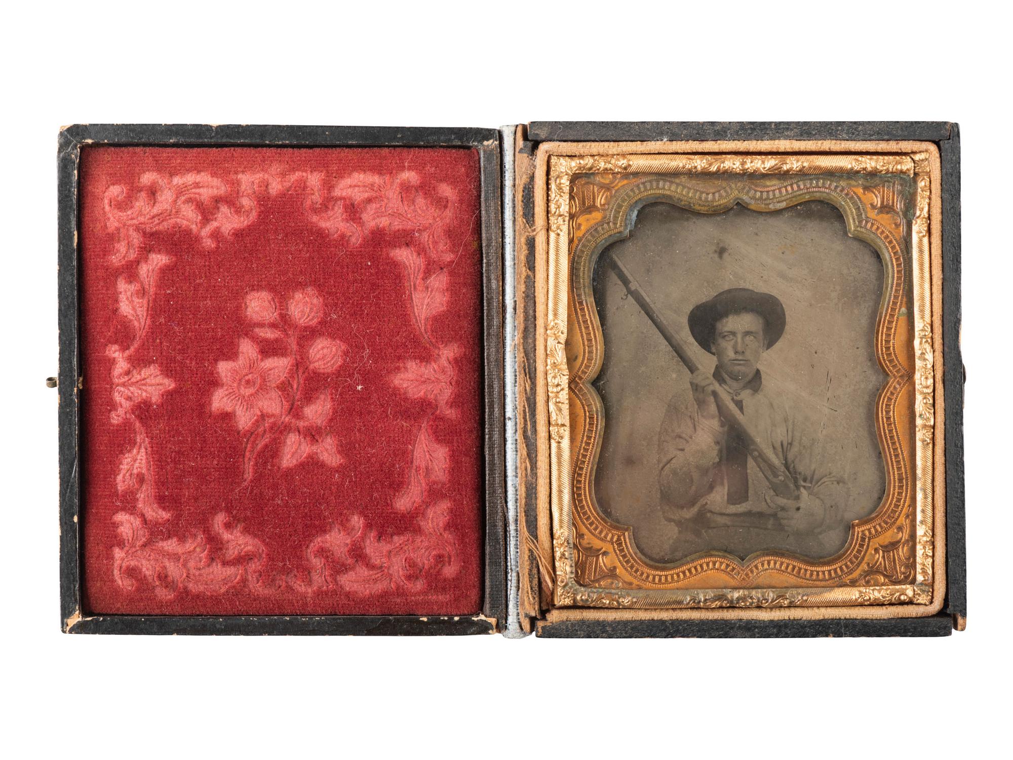 [CIVIL WAR - PHOTOGRAPHY]. Sixth plate ambrotype of an armed Confederate private. N.p.: N.p., [ca 1861-1865].
