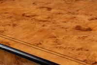 A Biedermeier Style Part Ebonized Burlwood Extending Dining Table