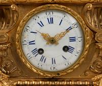 A French Gilt Bronze and Marble Mantel Clock
