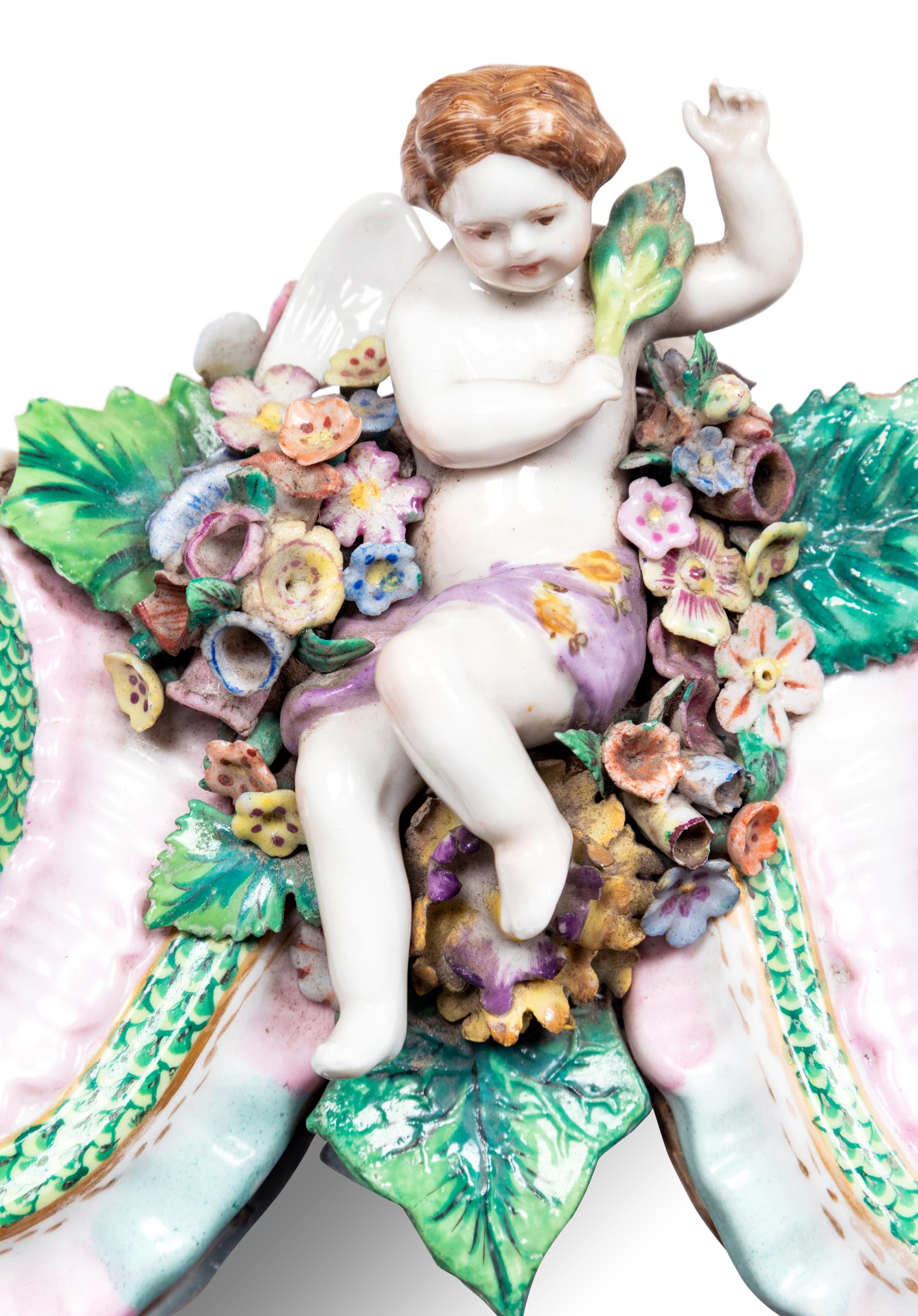 A Pair of Continental Porcelain Girandole Mirrors