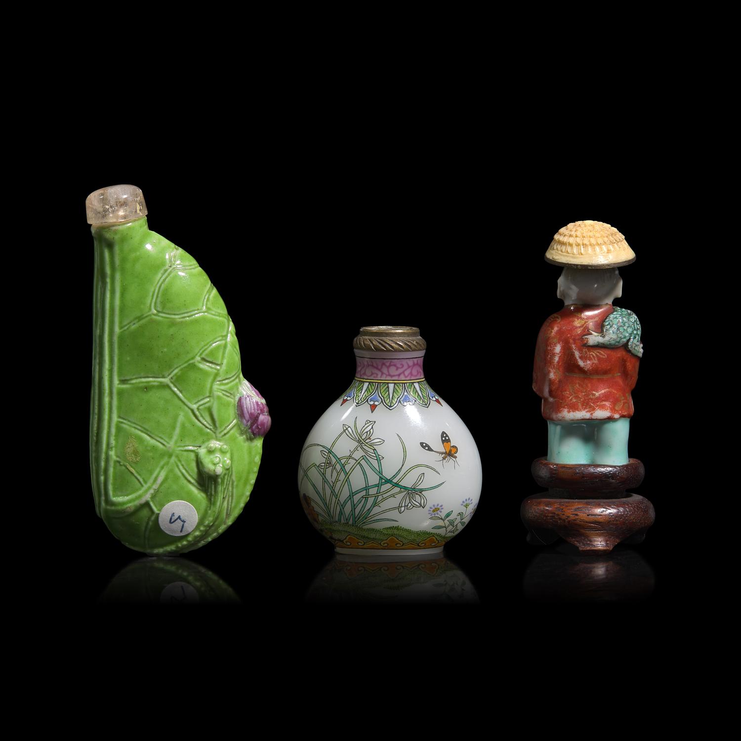 Two Chinese Molded Porcelain and One Enameled Glass Snuff Bottle