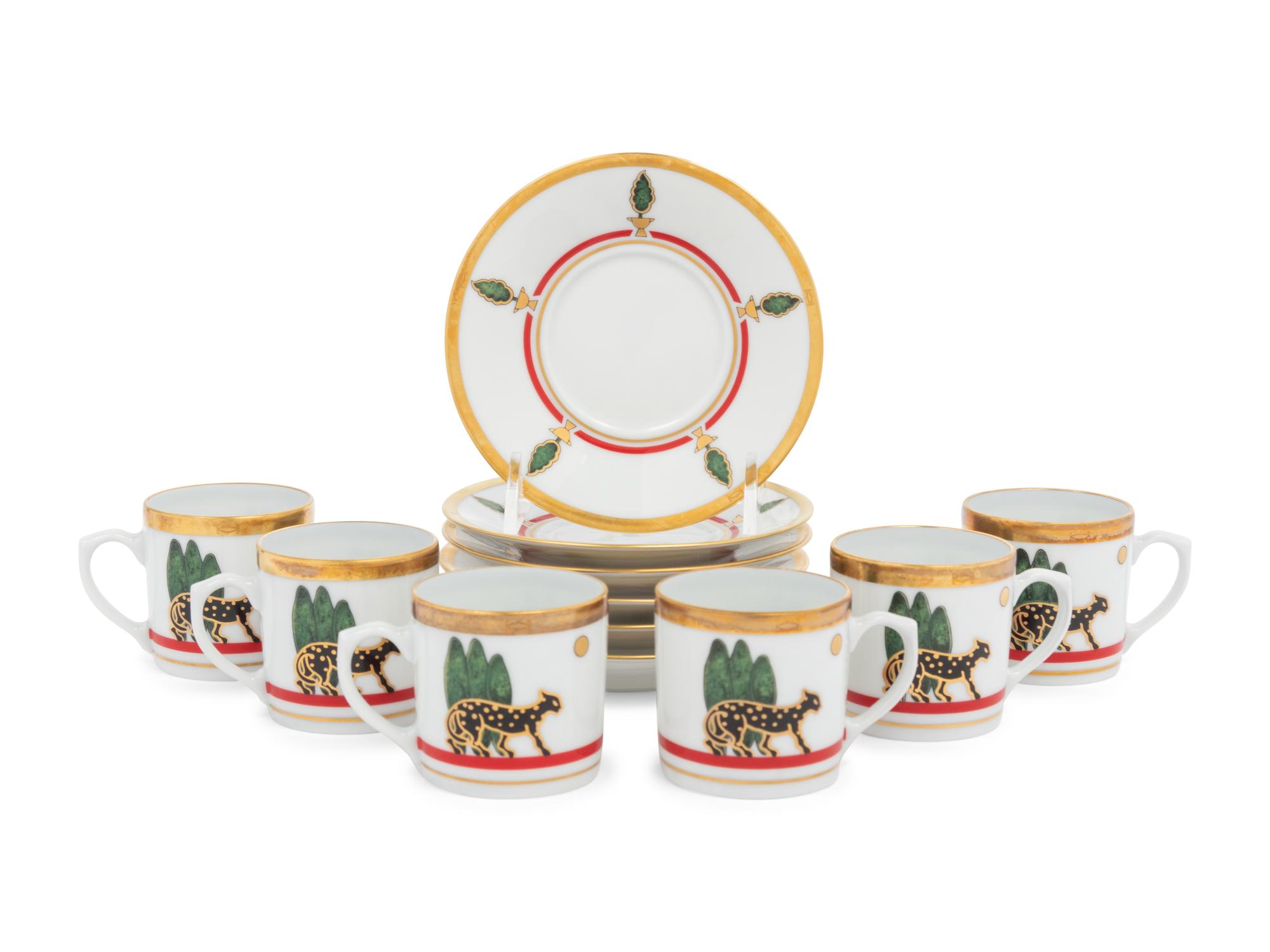 A Set of Six Cartier La Maison de Louis Porcelain Coffee Cups with Saucers