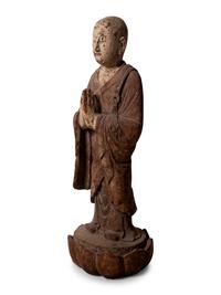 A Chinese Carved and Polychrome Decorated Wood Figure in Prayer