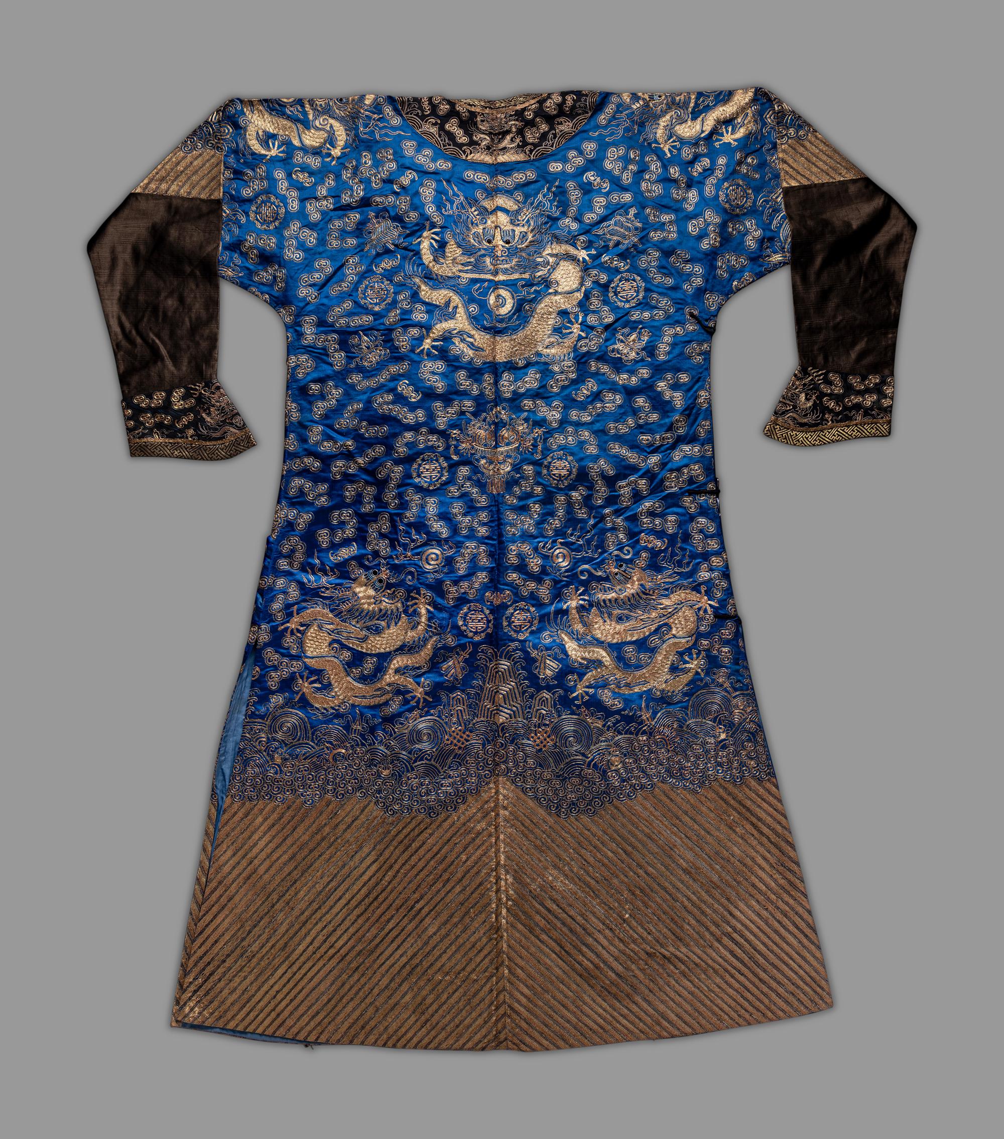 A Chinese Blue Ground Embroidered Silk Dragon Robe