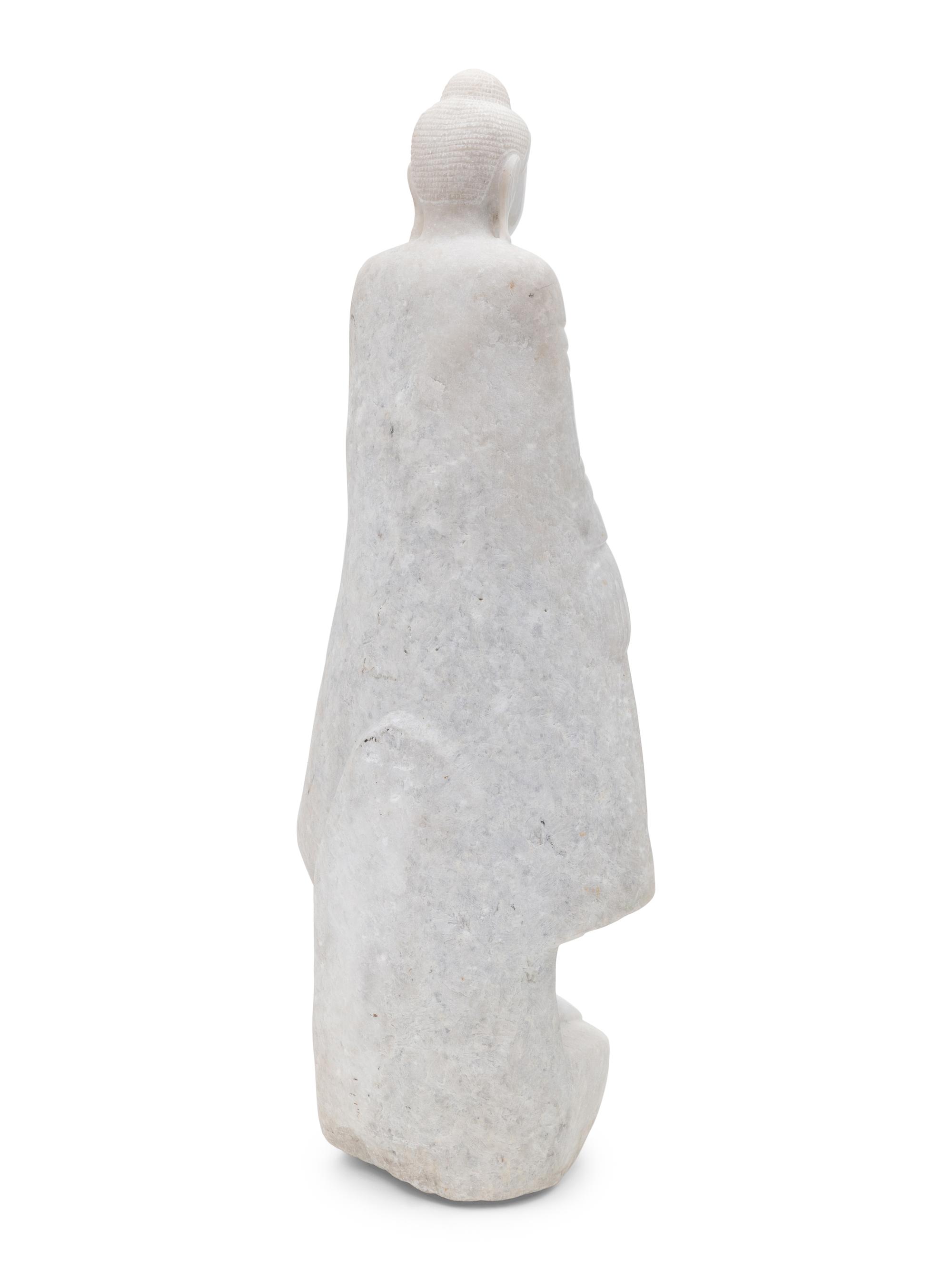 A Large White Marble Figure of Buddha