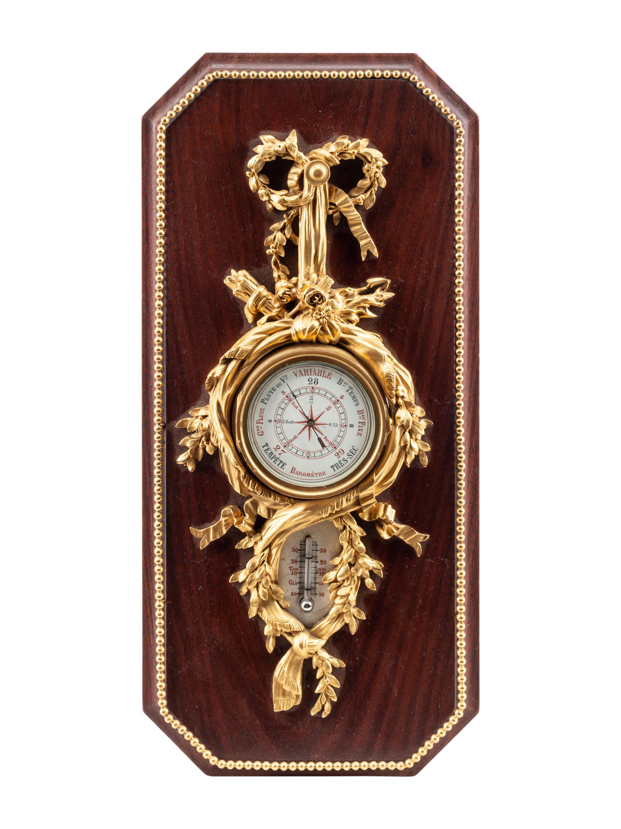 A French Gilt Bronze and Walnut Barometer