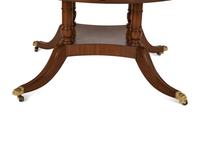 A Pair of Regency Style Mahogany Circular Dinner Tables