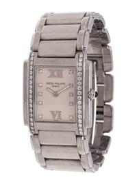 PATEK PHILIPPE, STAINLESS STEEL AND DIAMOND REF. 4910/010 'TWENTY-4' WRISTWATCH