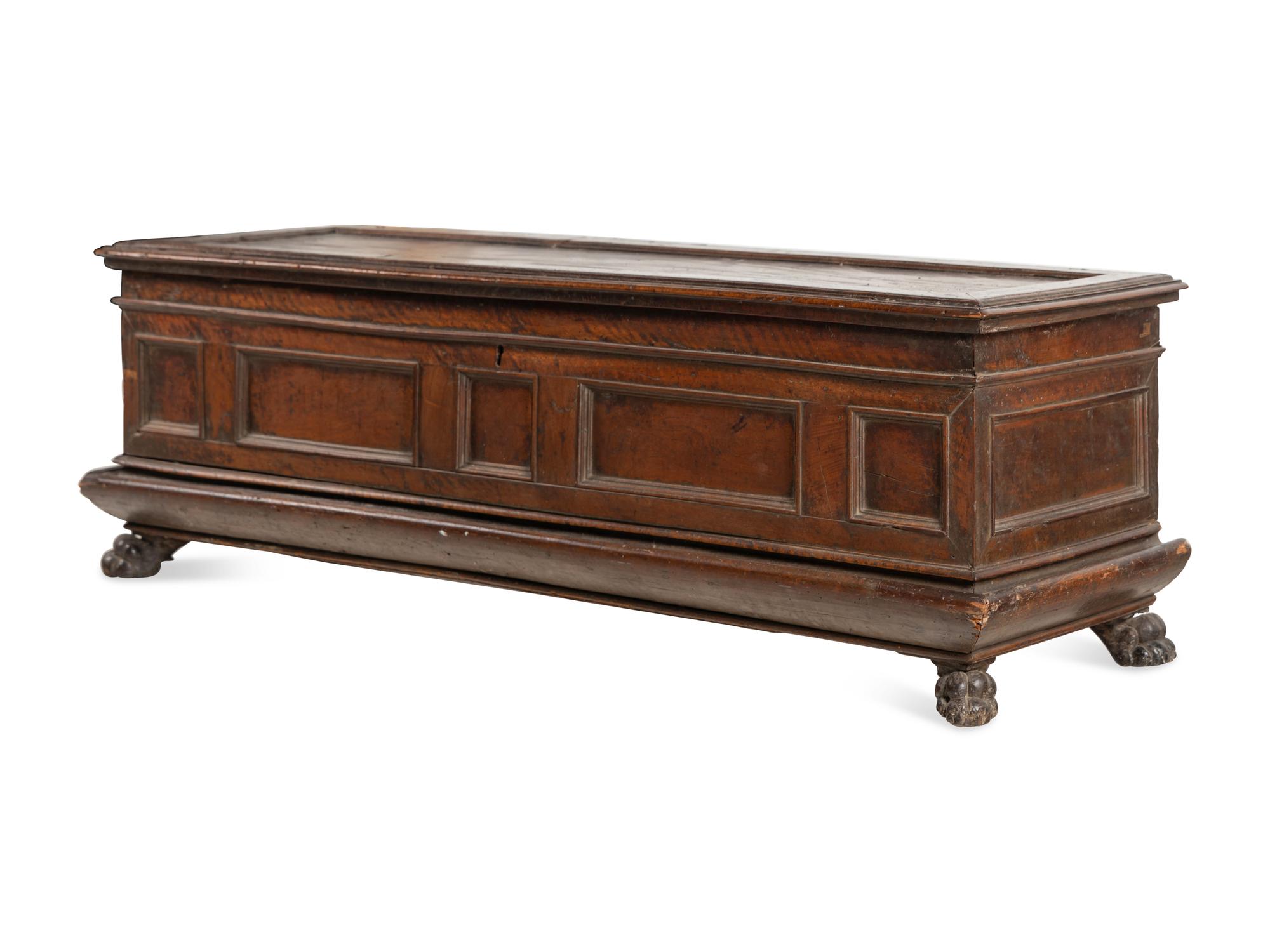 An Italian Carved Walnut Cassone