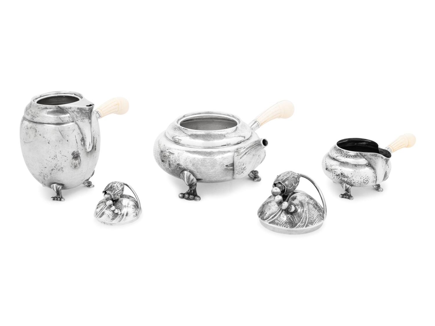 A Georg Jensen Silver Blossom Three-Piece Tea and Coffee Service