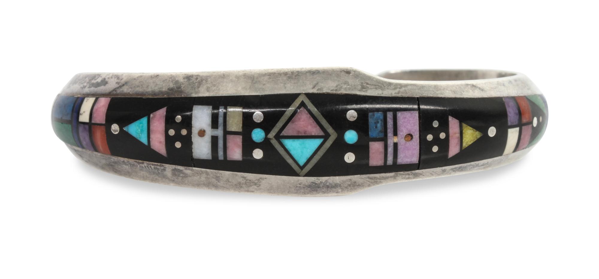 A Navajo Sterling and Multiple Stone Mosaic Bracelet, Jim Harrison Length 5 3/4 x opening 1 1/8 x width 3/4 inches.