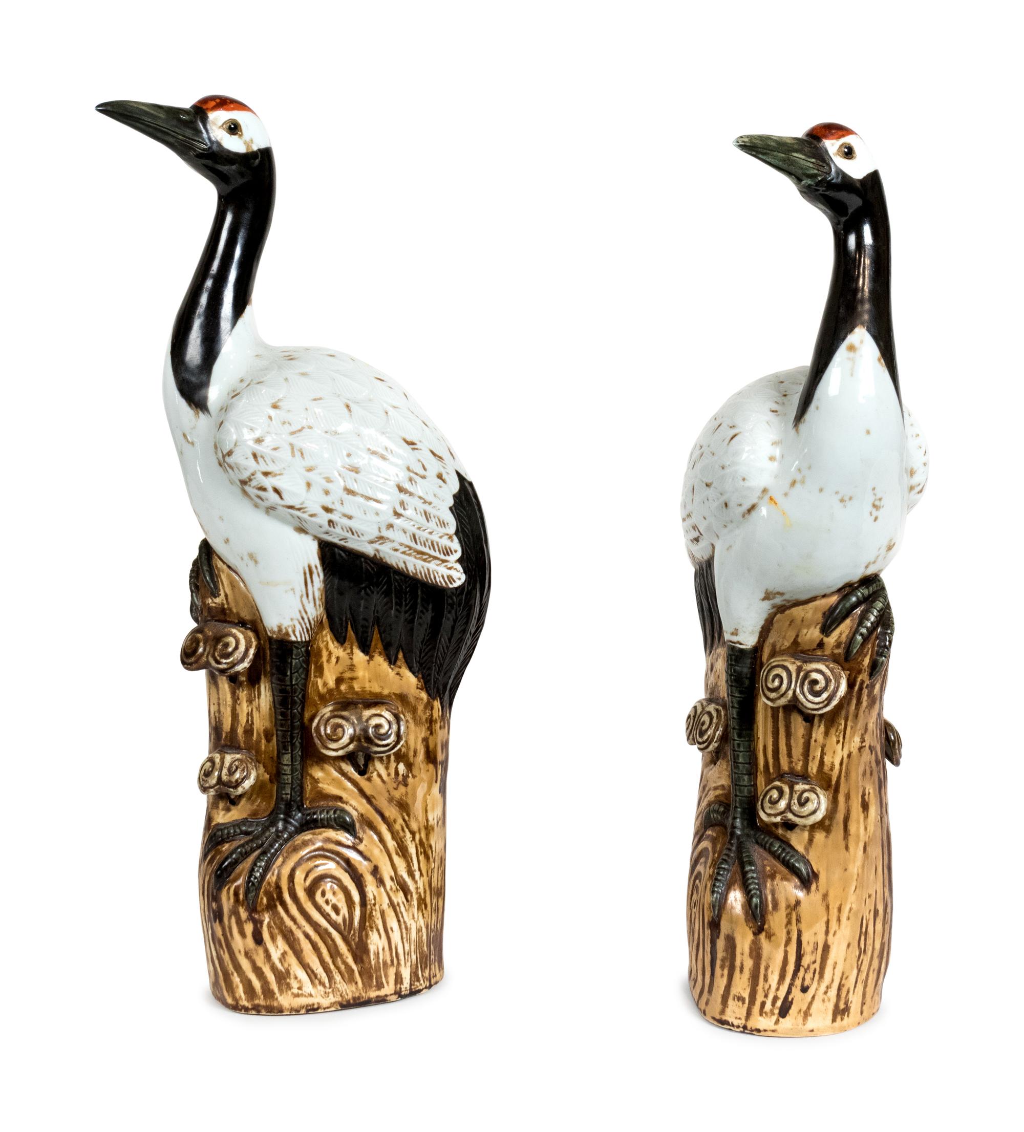 A Pair of Chinese Porcelain Figures of Cranes