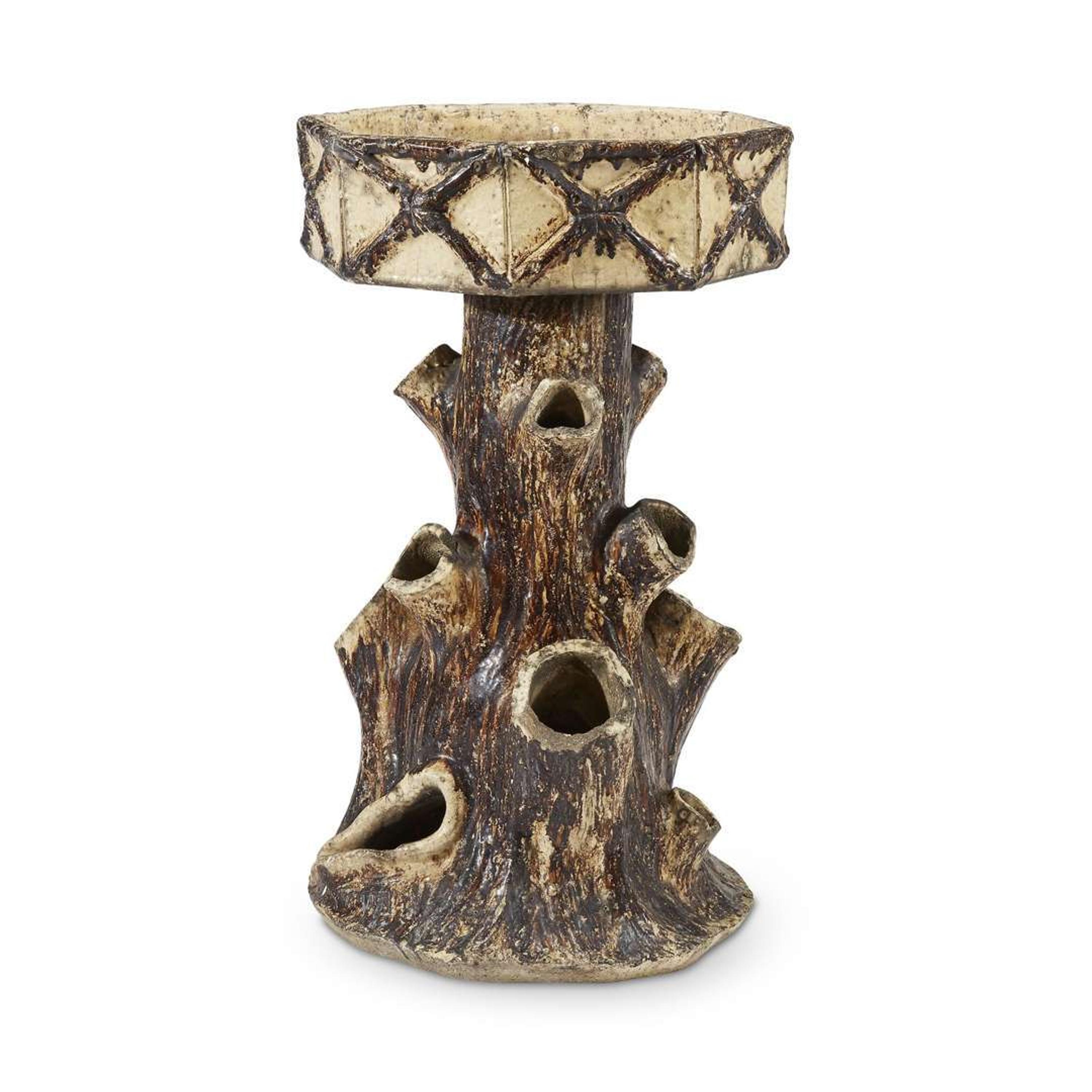 A pair of Victorian stoneware stump-form planters circa 1880