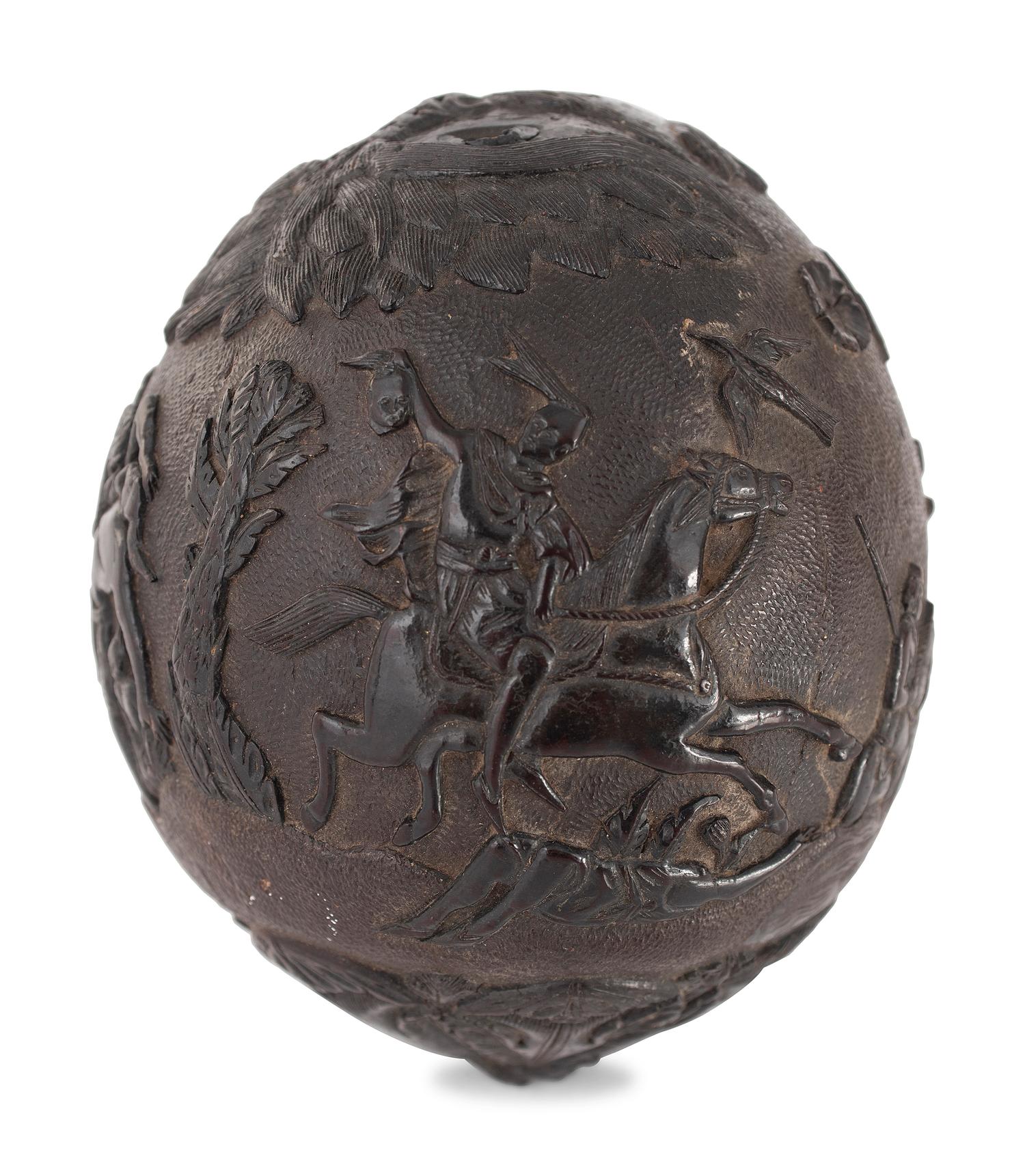 A Carved Coconut Depicting a Grisly American Indian Scene