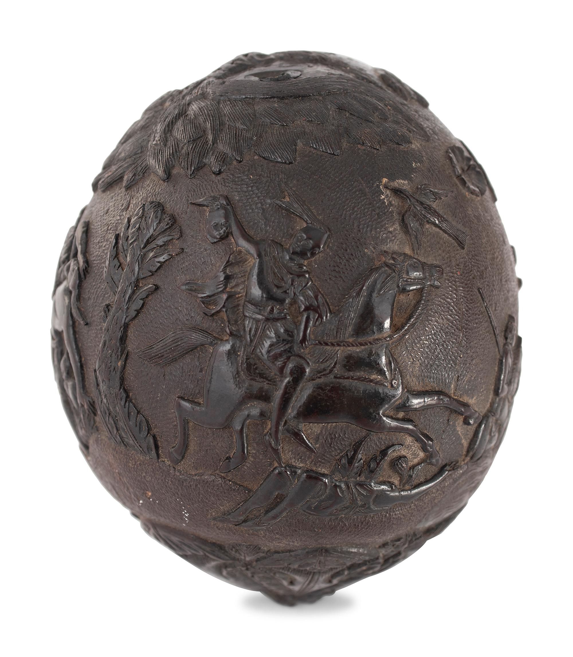 A Carved Coconut Depicting a Grisly American Indian Scene