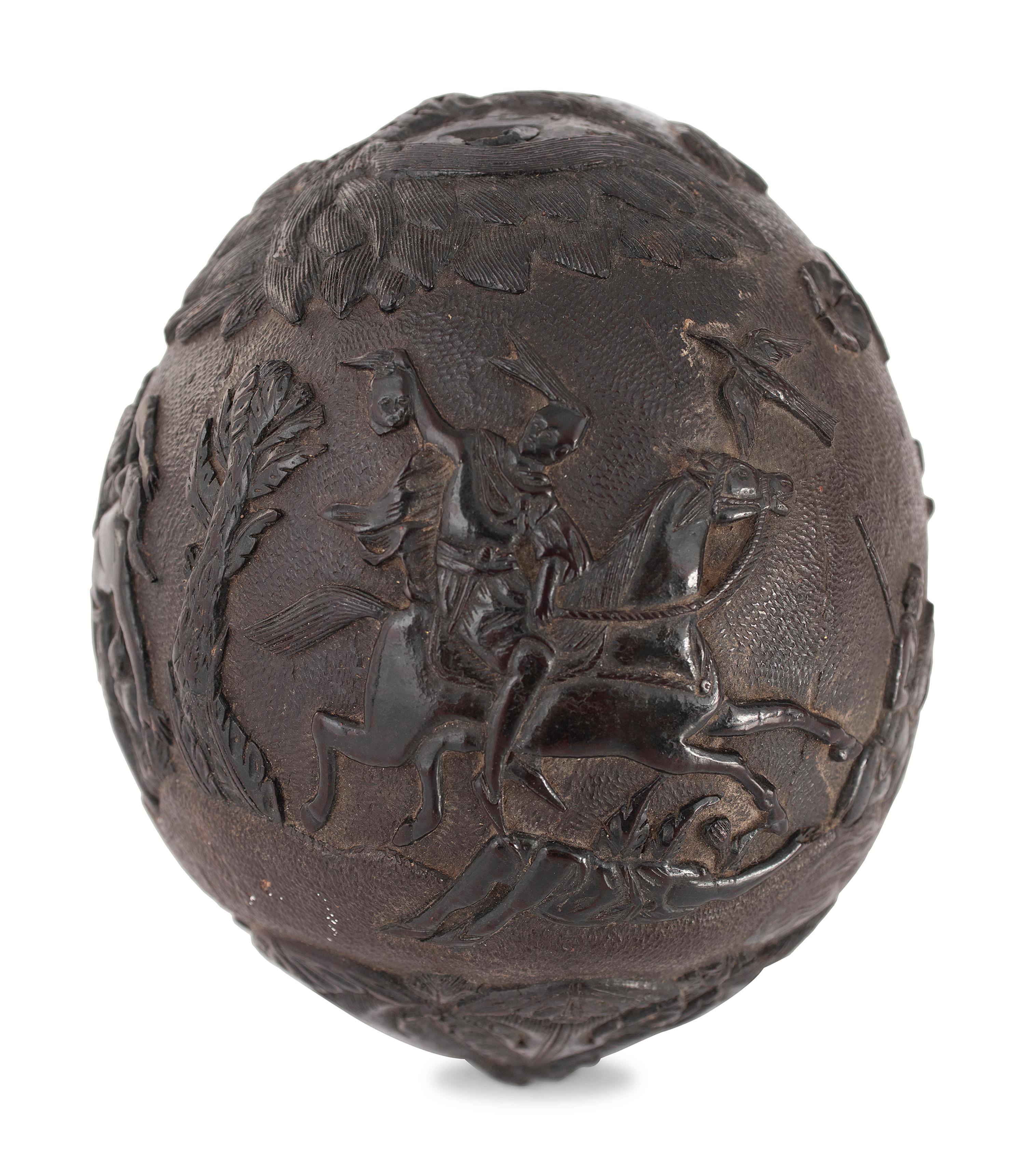 A Carved Coconut Depicting a Grisly American Indian Scene