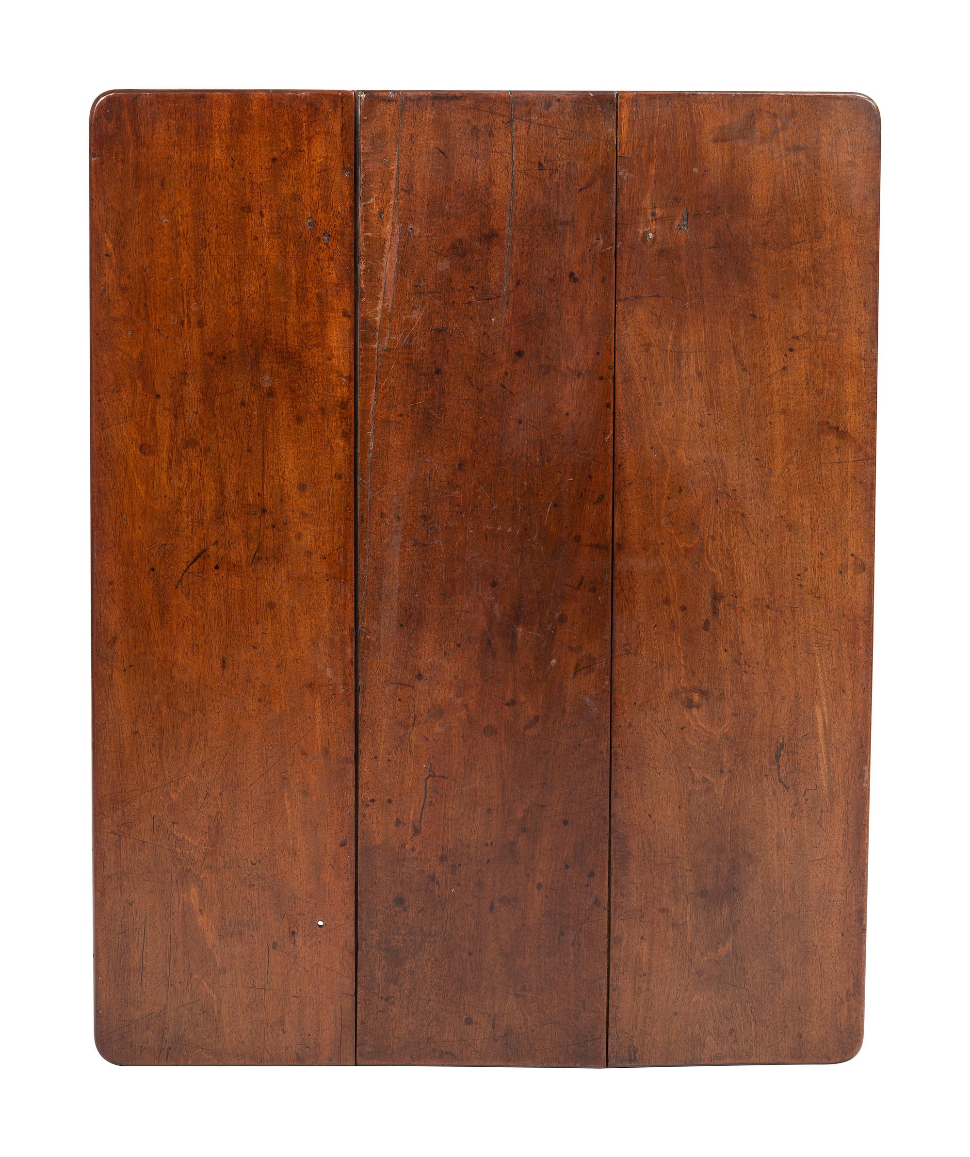 A George III Mahogany Drop Leaf Table