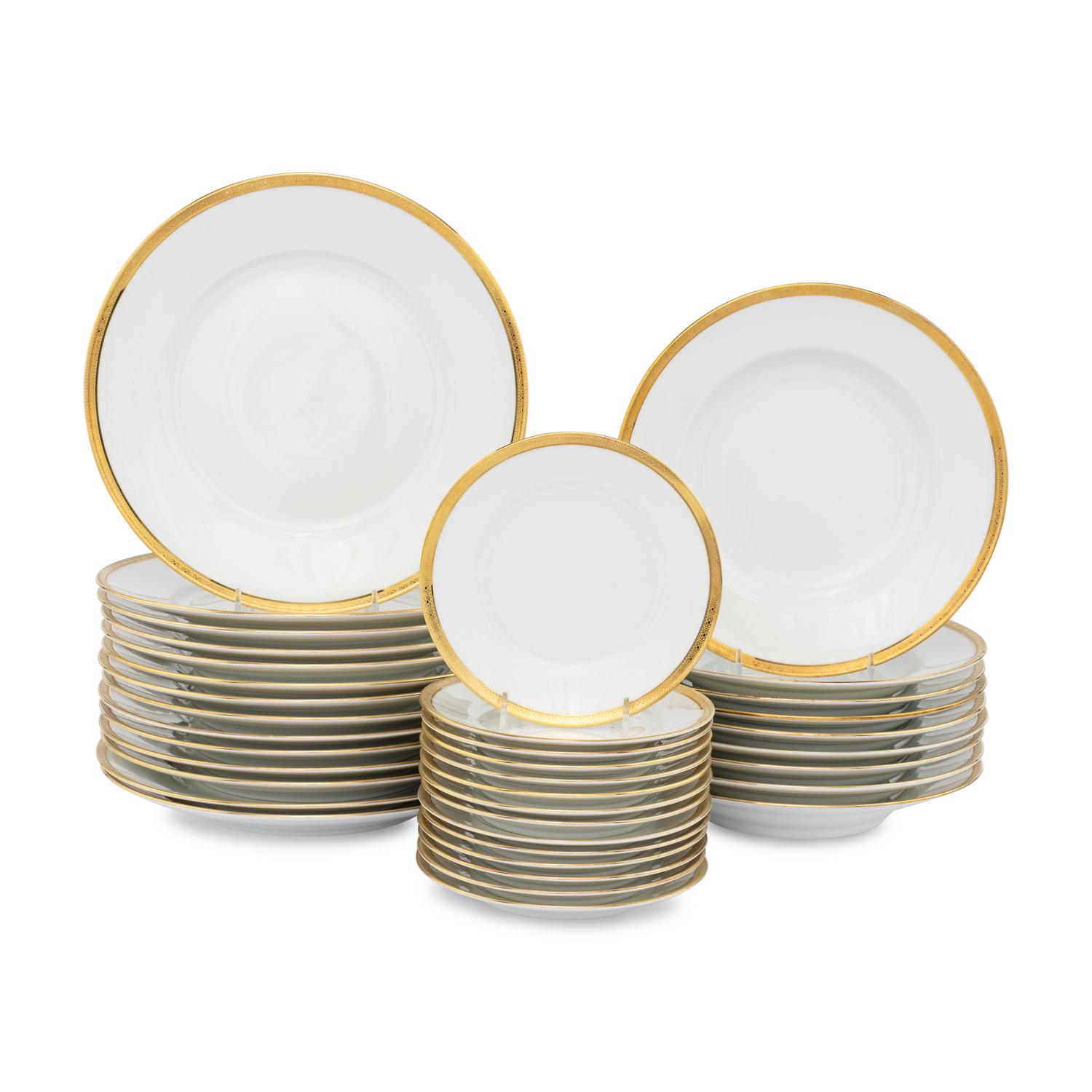 A Richard Ginori Gilt Banded Part Dinner Service