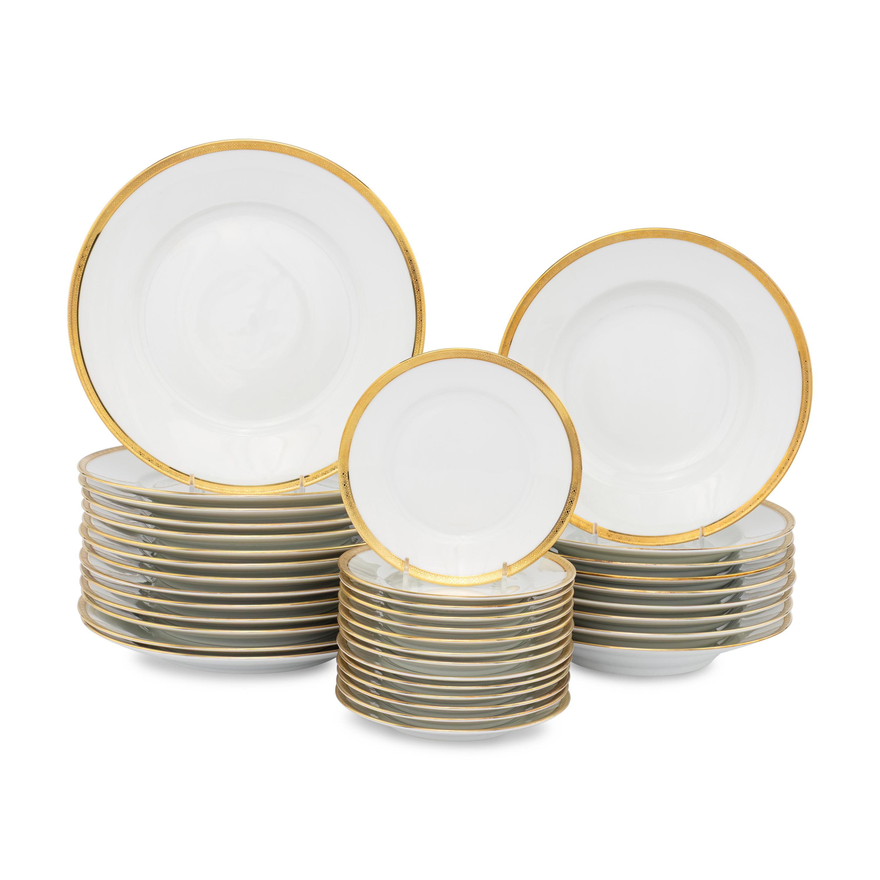 A Richard Ginori Gilt Banded Part Dinner Service