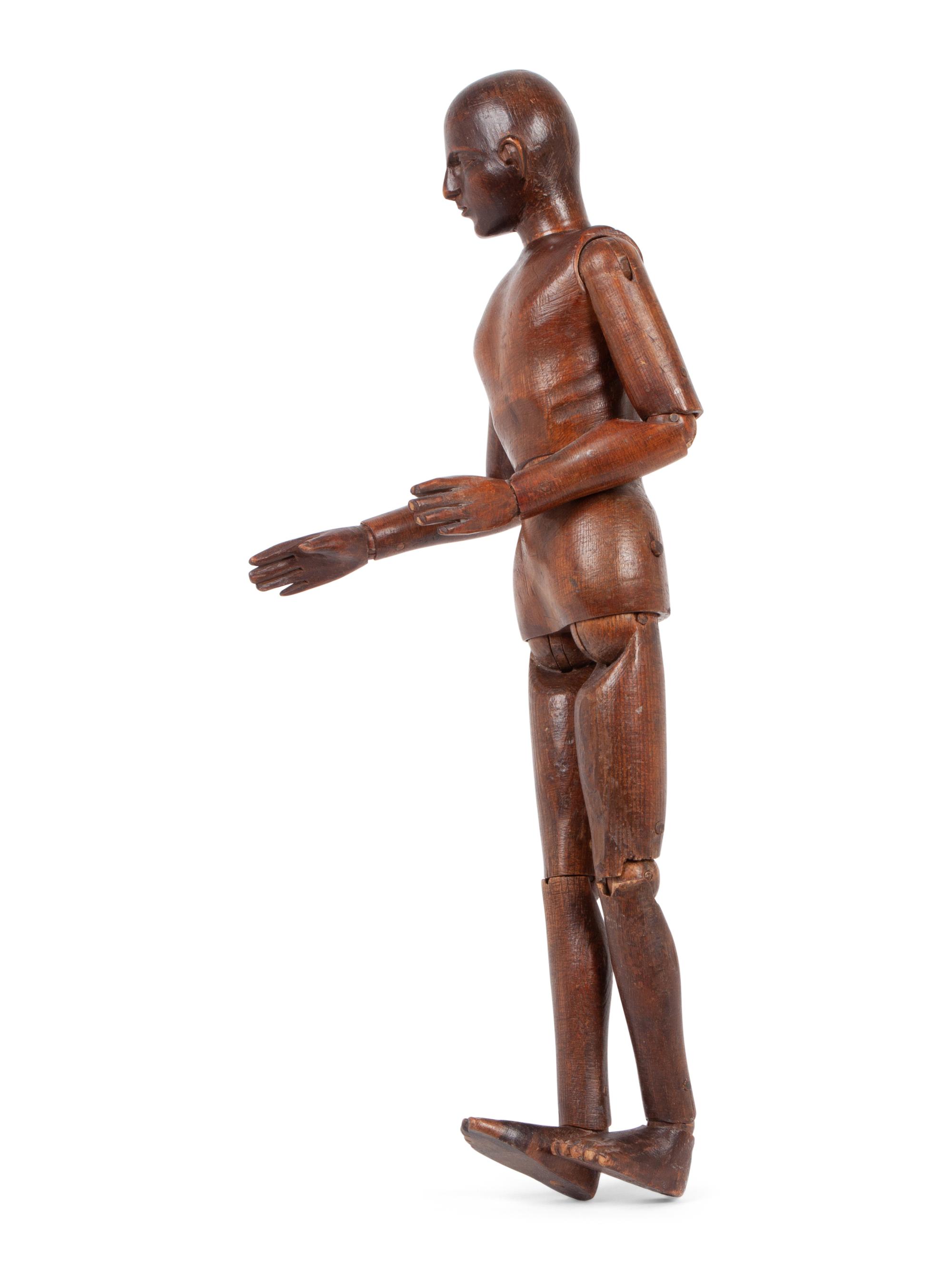 An Articulated Carved Wood Artist's Model