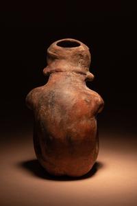 A Colima Terracotta Squatting Figure