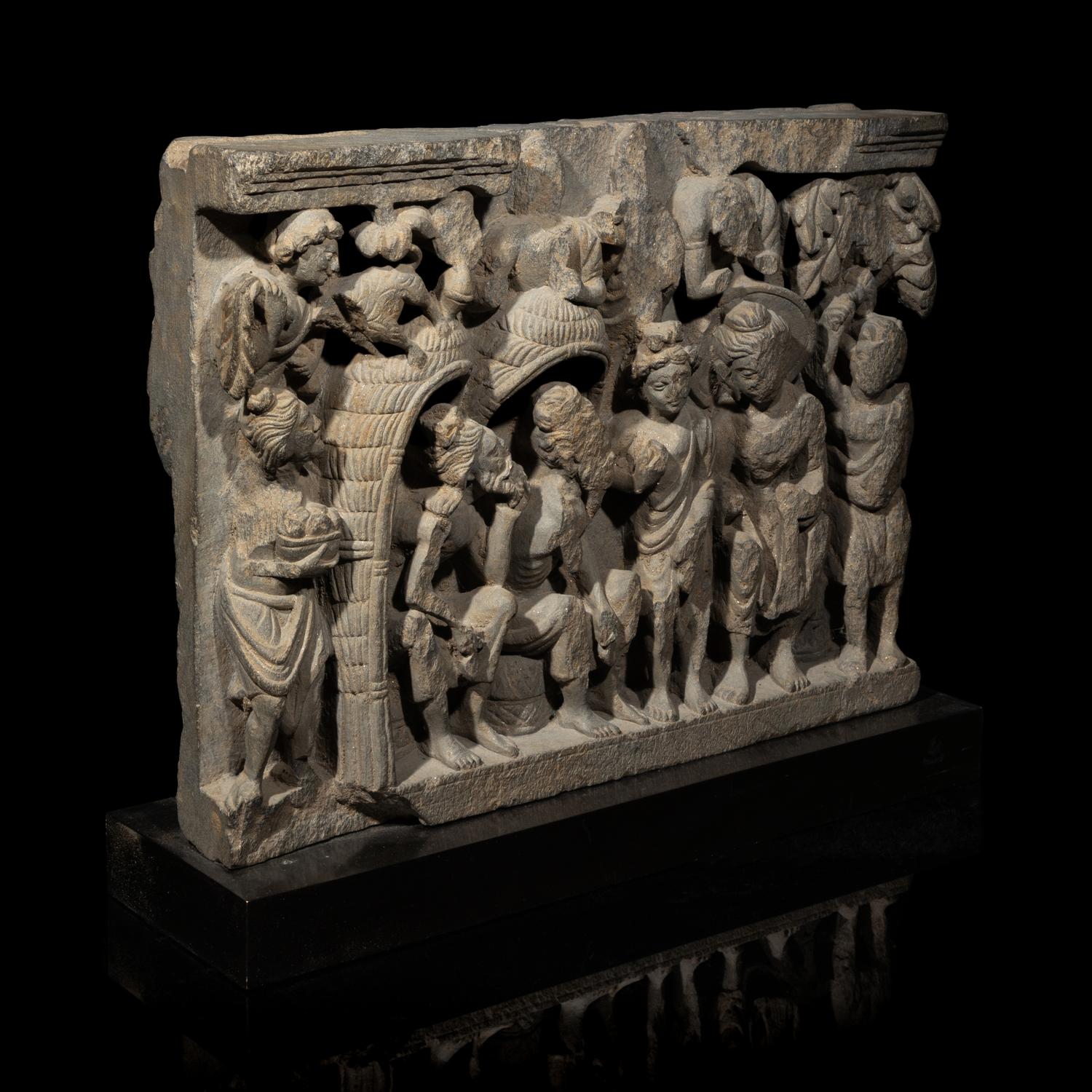 A Gandharan Grey Schist Relief Depicting Buddha Visiting Kashyapa, 2nd/3rd Century