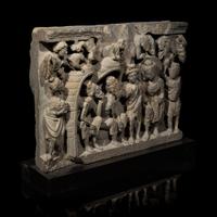 A Gandharan Grey Schist Relief Depicting Buddha Visiting Kashyapa, 2nd/3rd Century